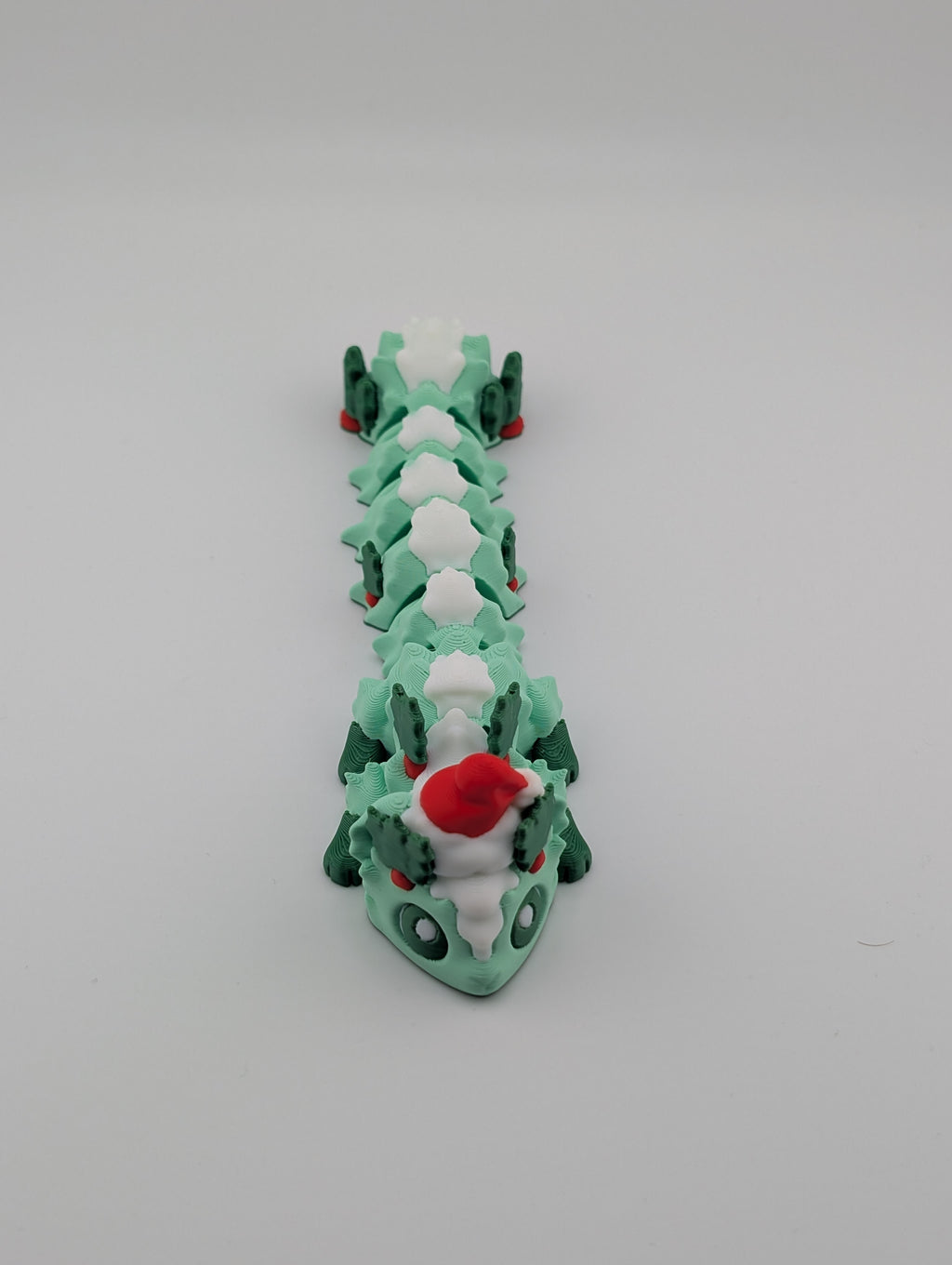 Festive Skunk Mini Dragon – Christmas Edition Flexible Fidget Toy for All Ages