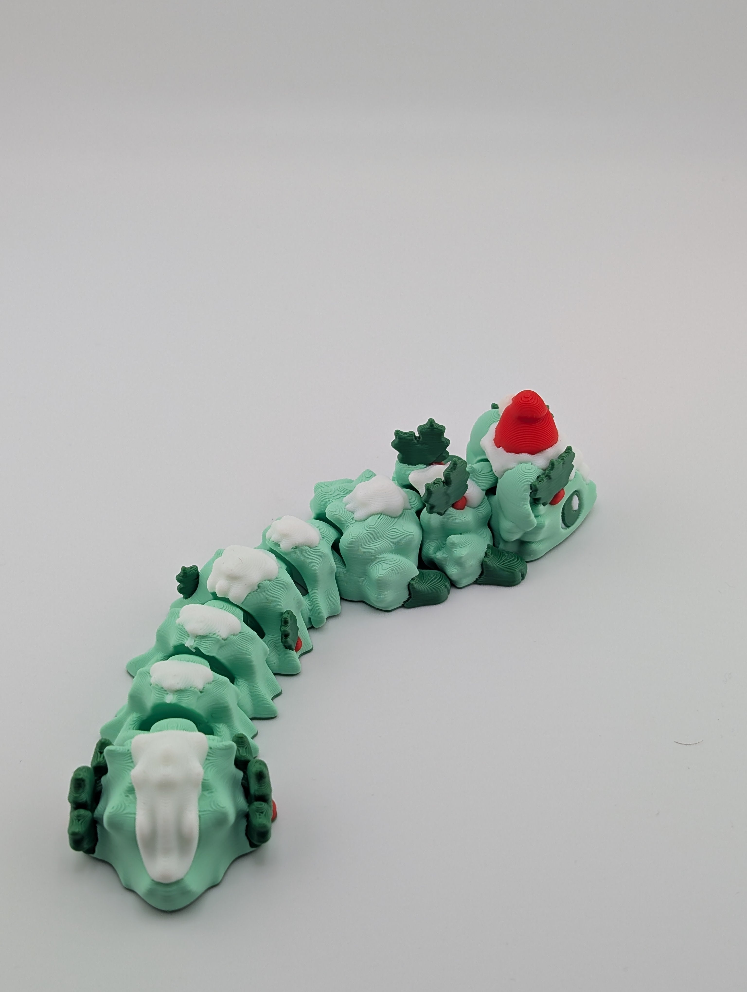Festive Skunk Mini Dragon – Christmas Edition Flexible Fidget Toy for All Ages