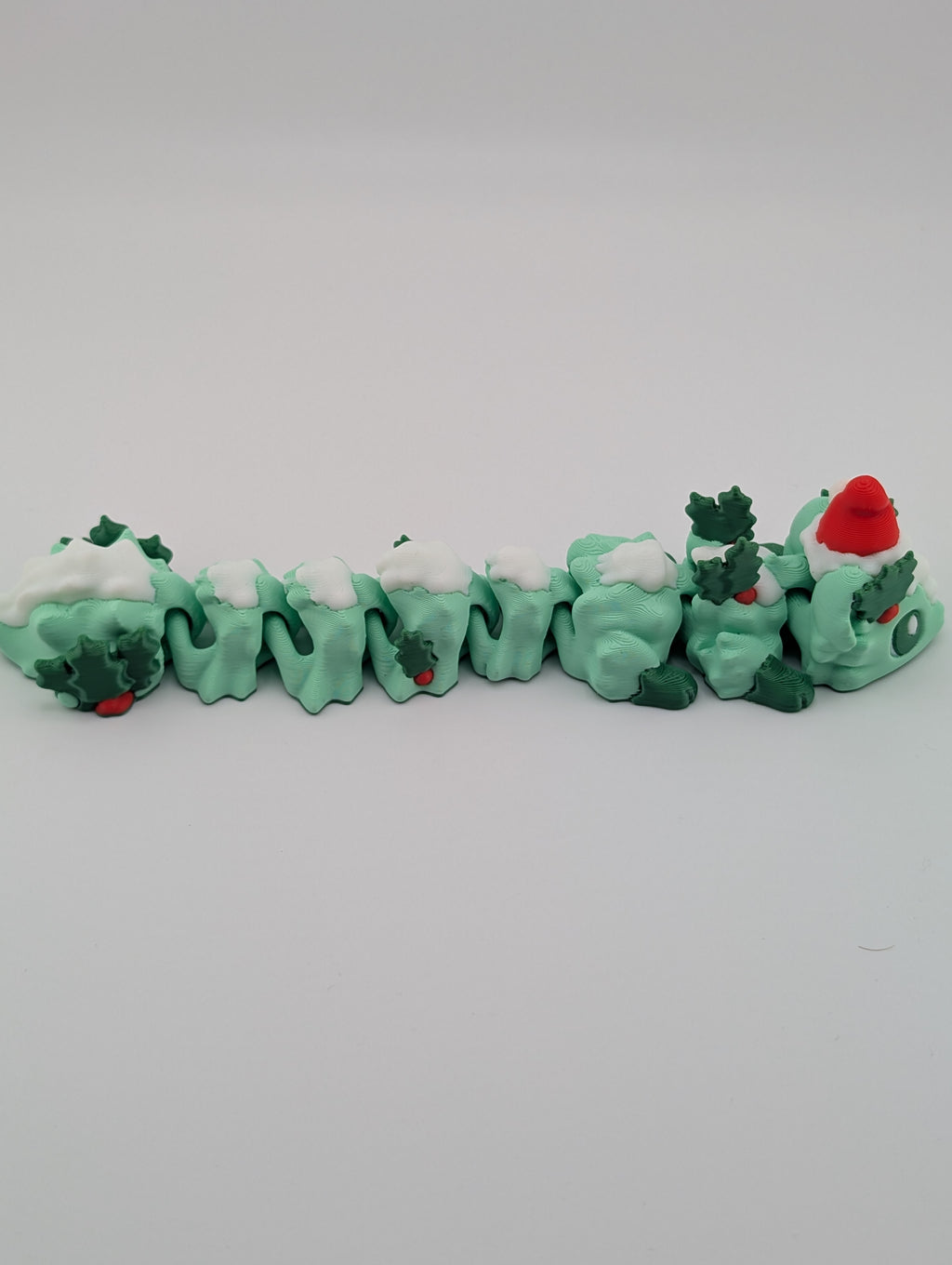 Festive Skunk Mini Dragon – Christmas Edition Flexible Fidget Toy for All Ages