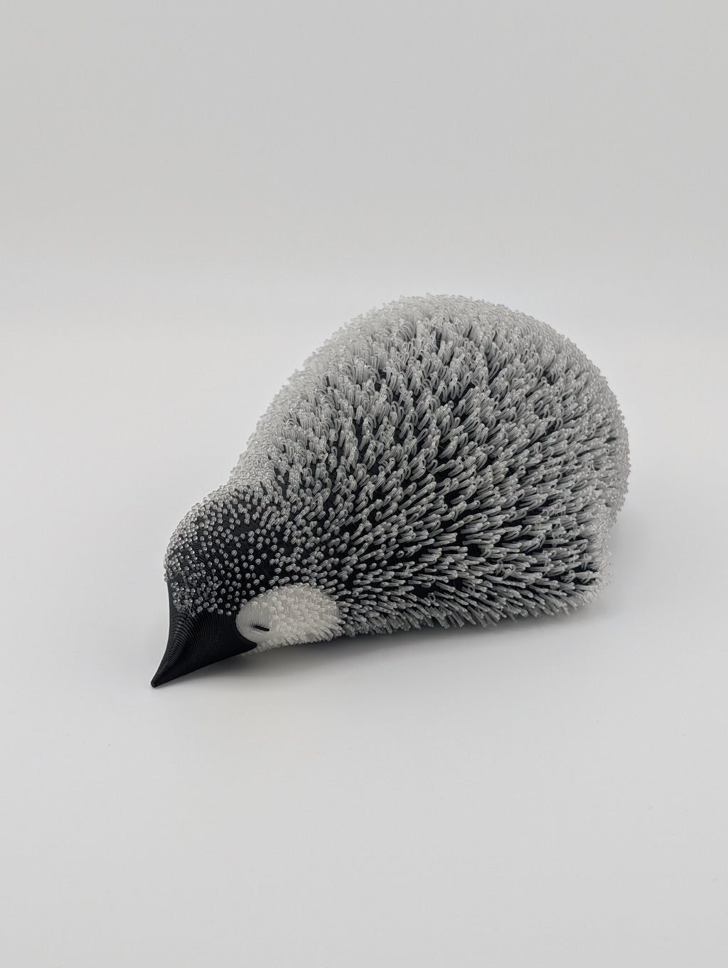 Lying Fluffy Little Penguin – UV Reactive Winter Decor