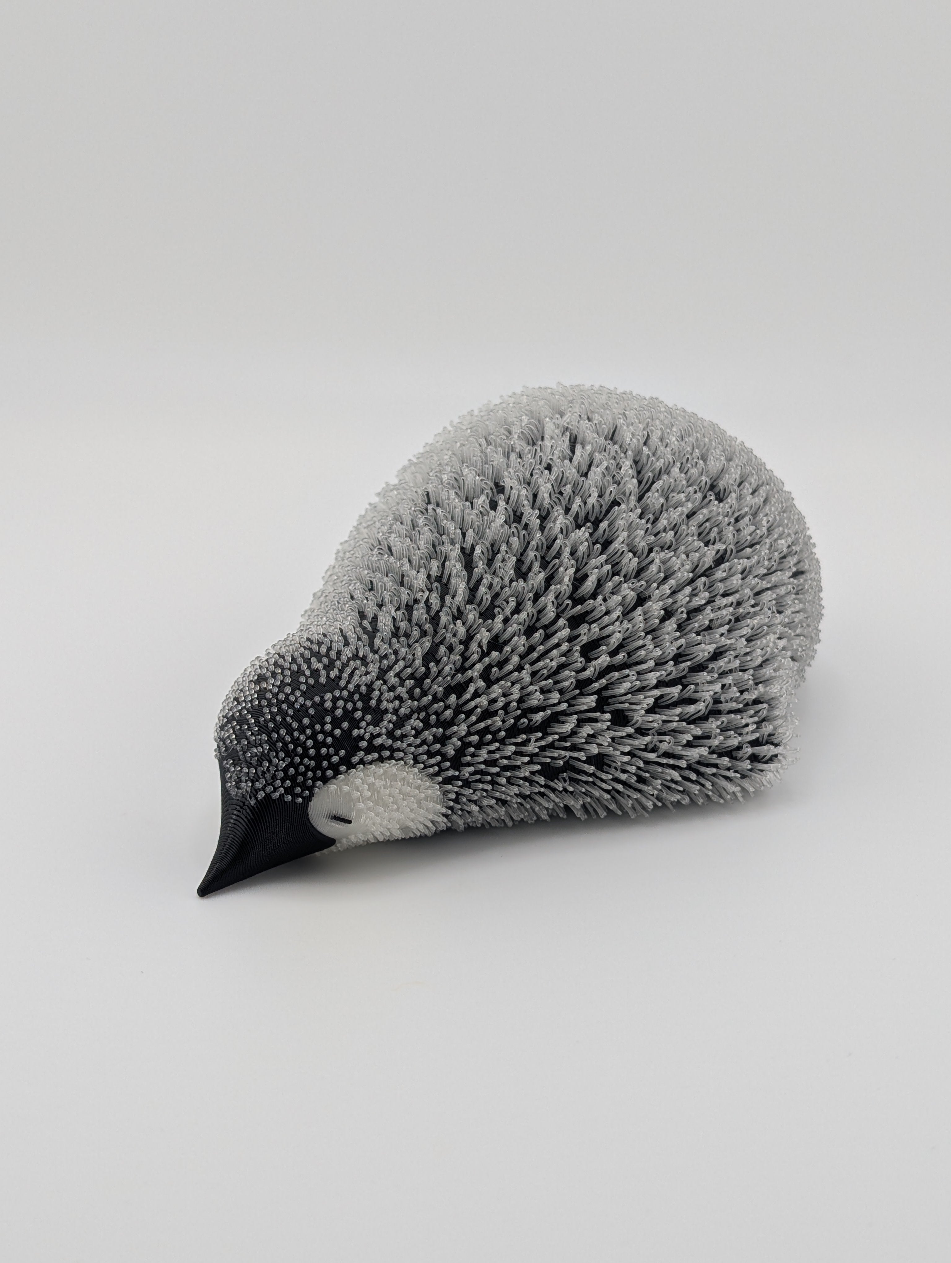 Lying Fluffy Little Penguin – UV Reactive Winter Decor