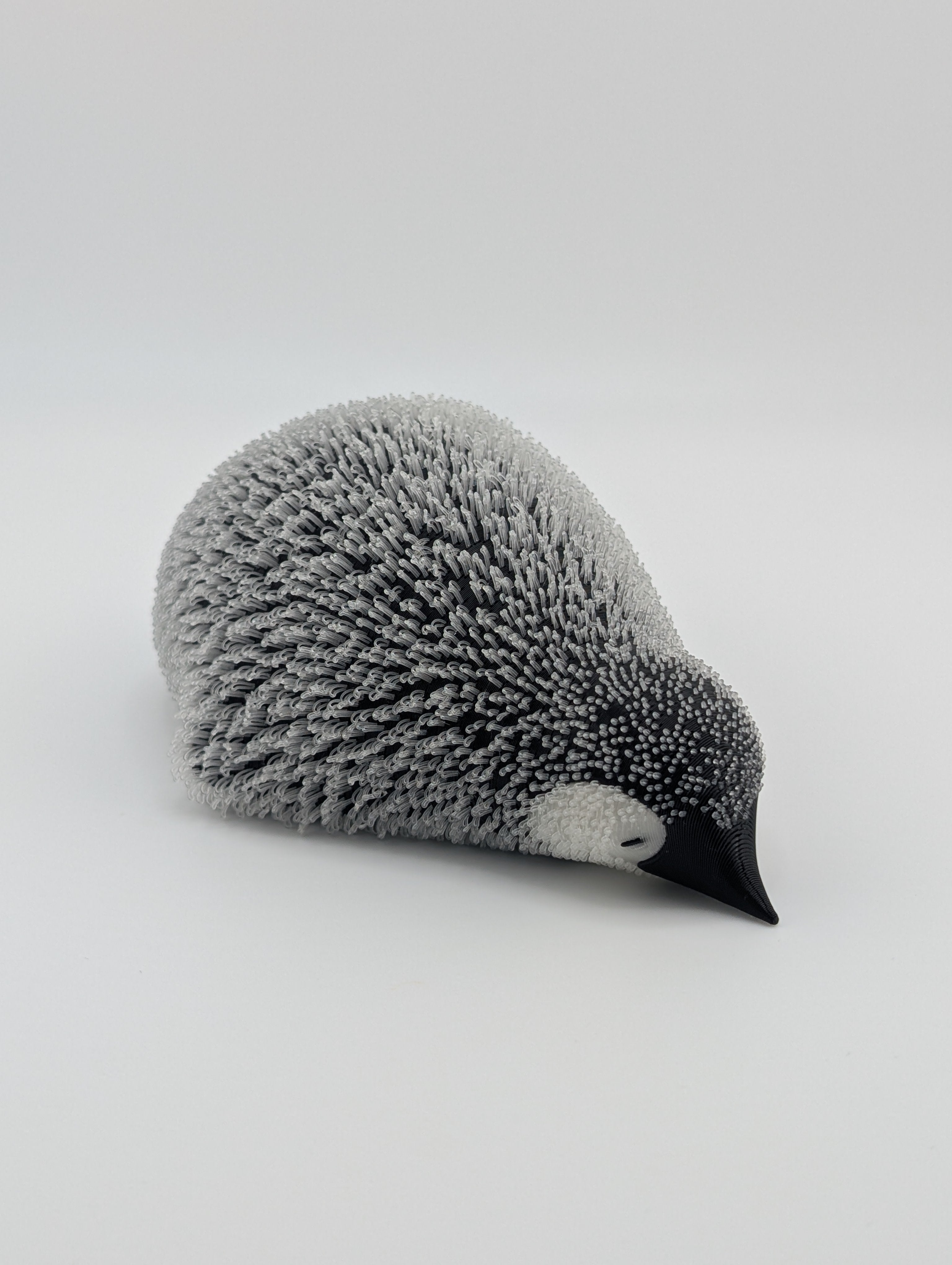 Lying Fluffy Little Penguin – UV Reactive Winter Decor