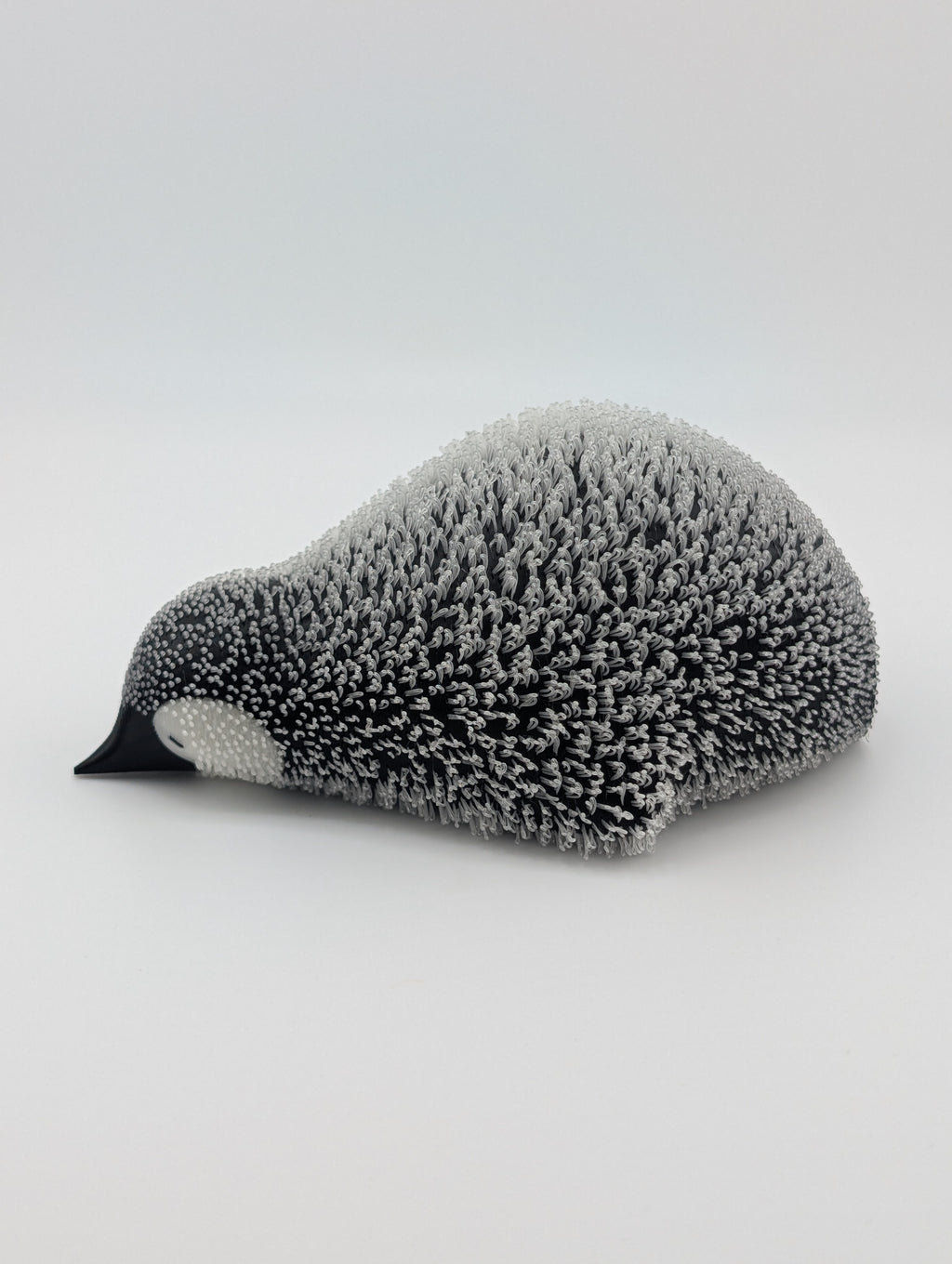 Lying Fluffy Little Penguin – UV Reactive Winter Decor