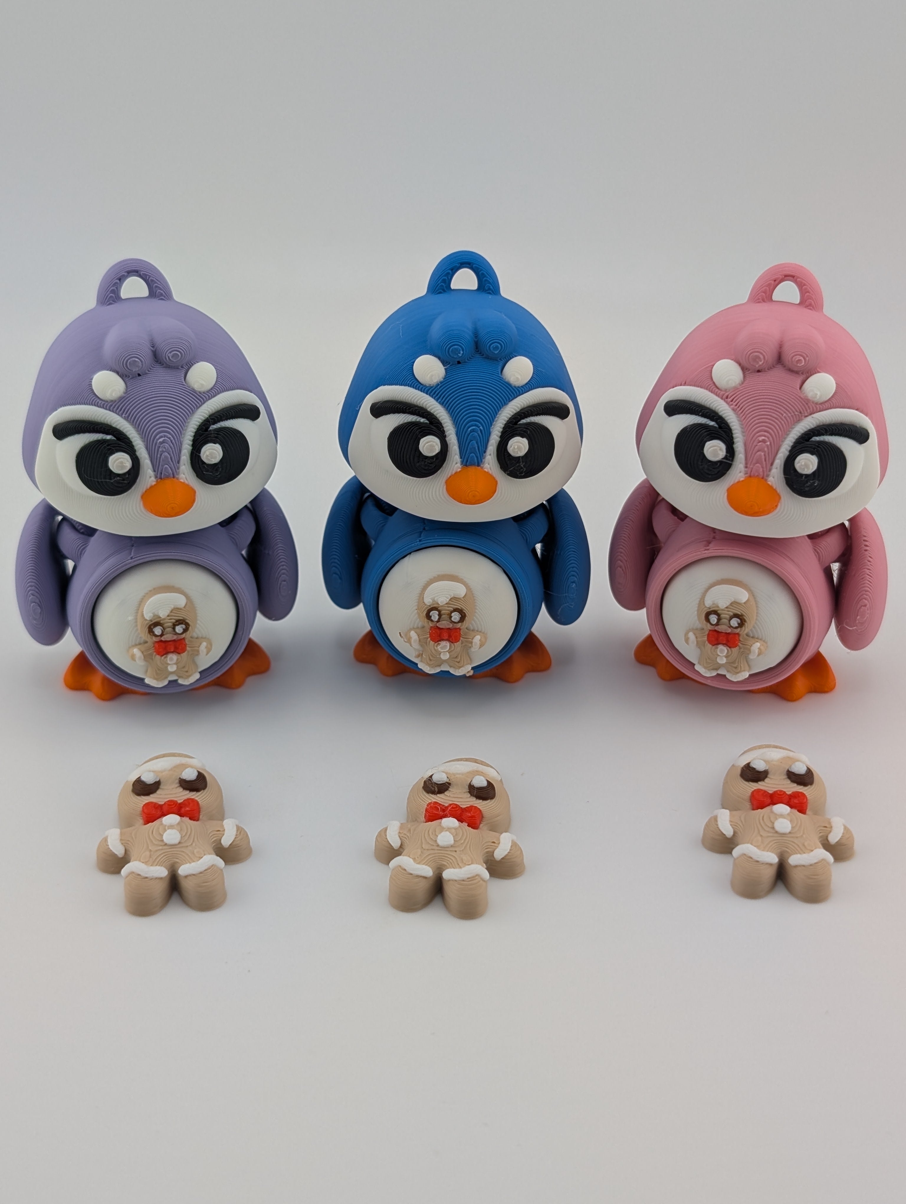 Waddle into fun with our Penguin Clicker Keychains!