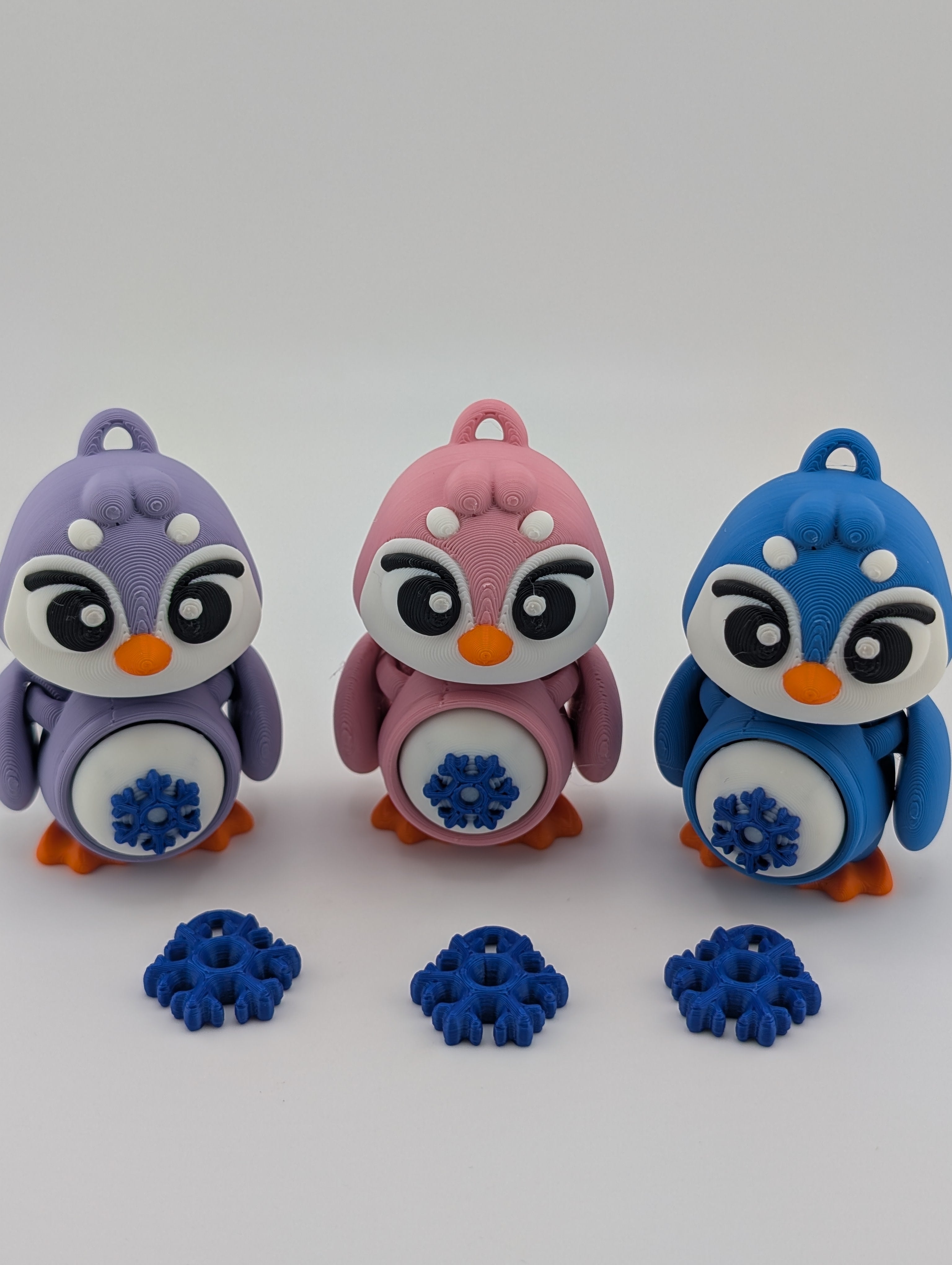 Waddle into fun with our Penguin Clicker Keychains!