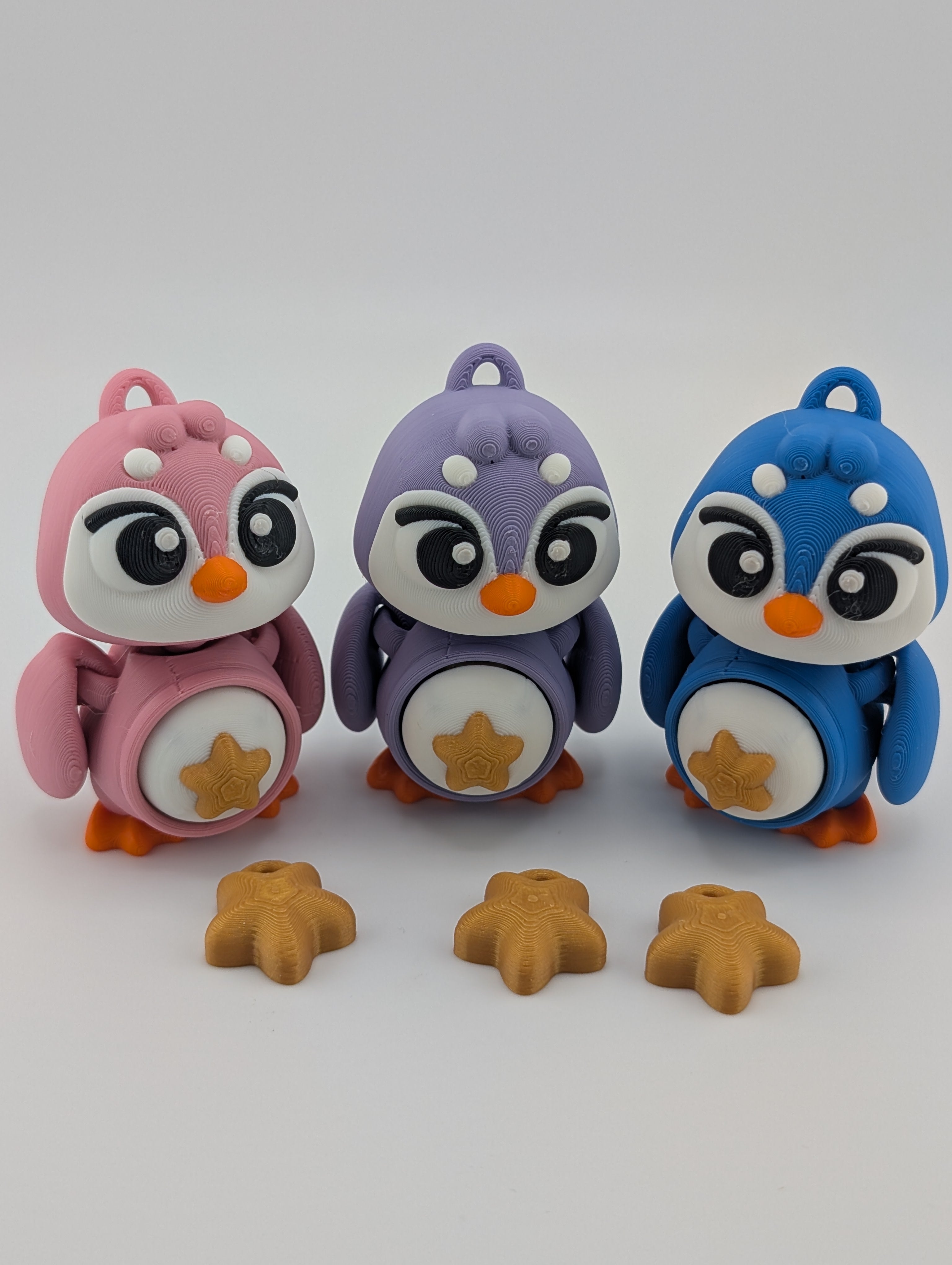 Waddle into fun with our Penguin Clicker Keychains!