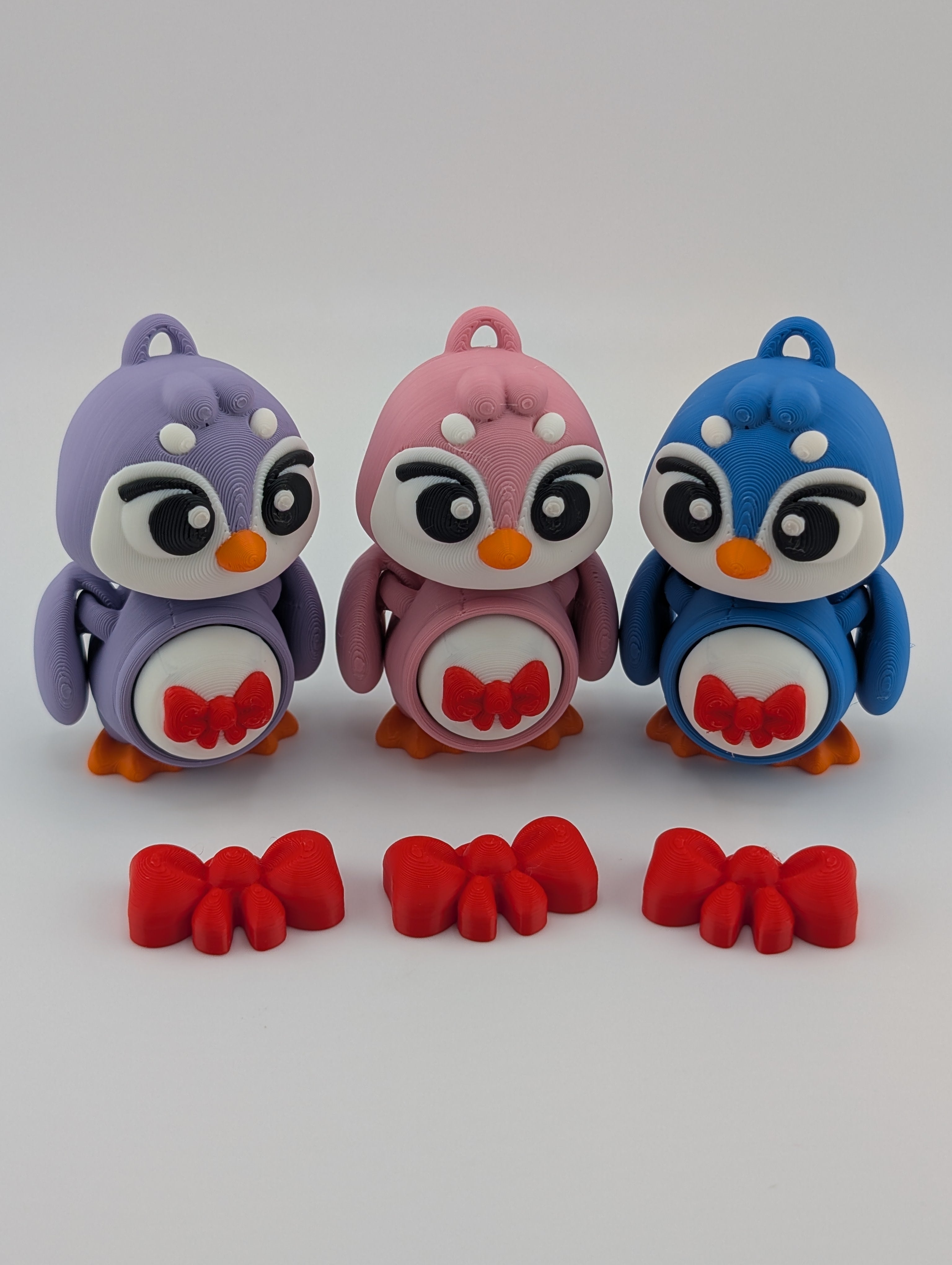 Waddle into fun with our Penguin Clicker Keychains!