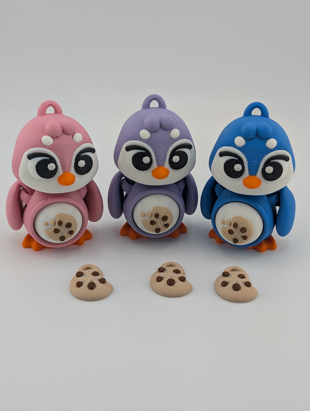 Waddle into fun with our Penguin Clicker Keychains!