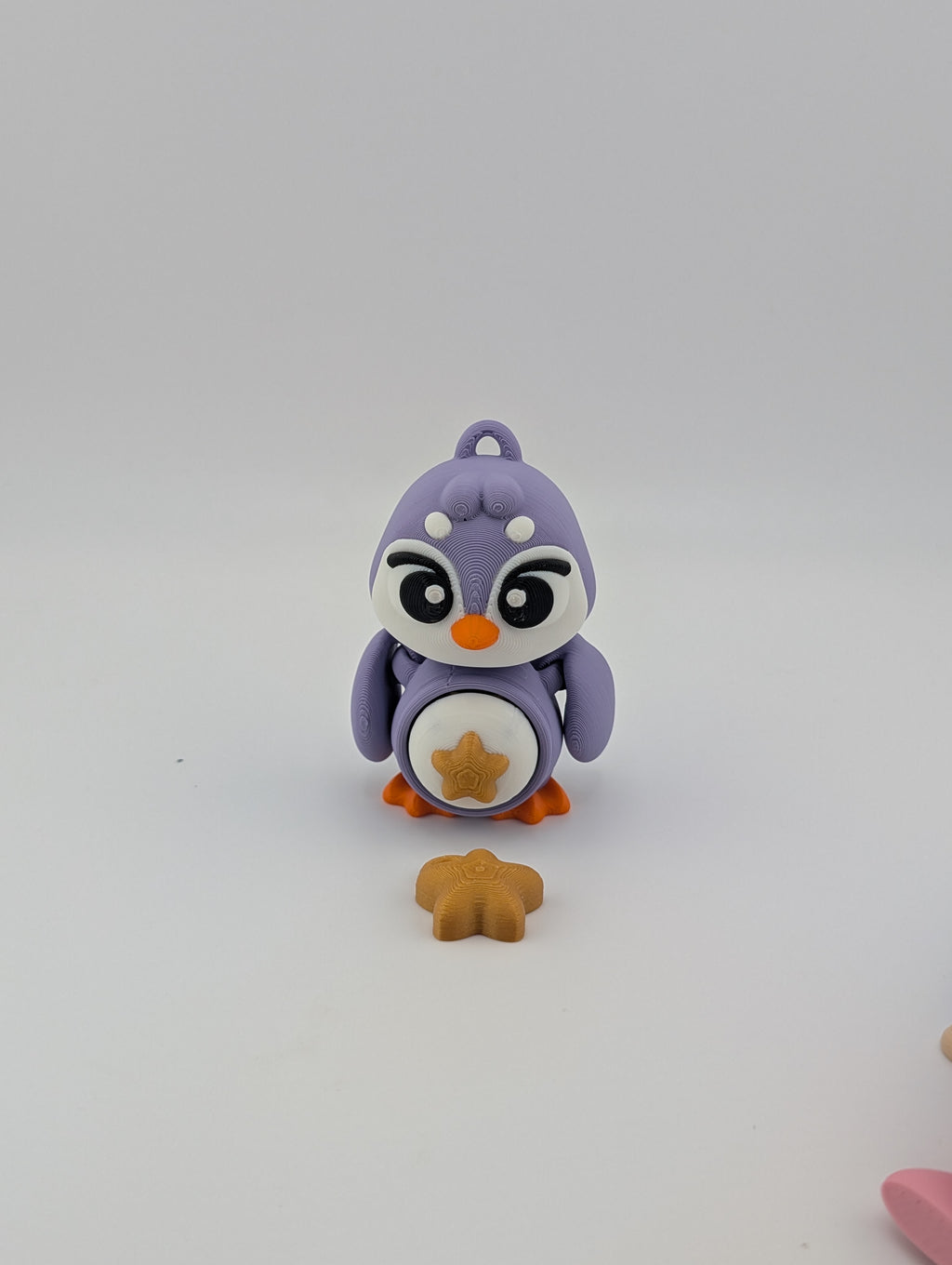Waddle into fun with our Penguin Clicker Keychains!
