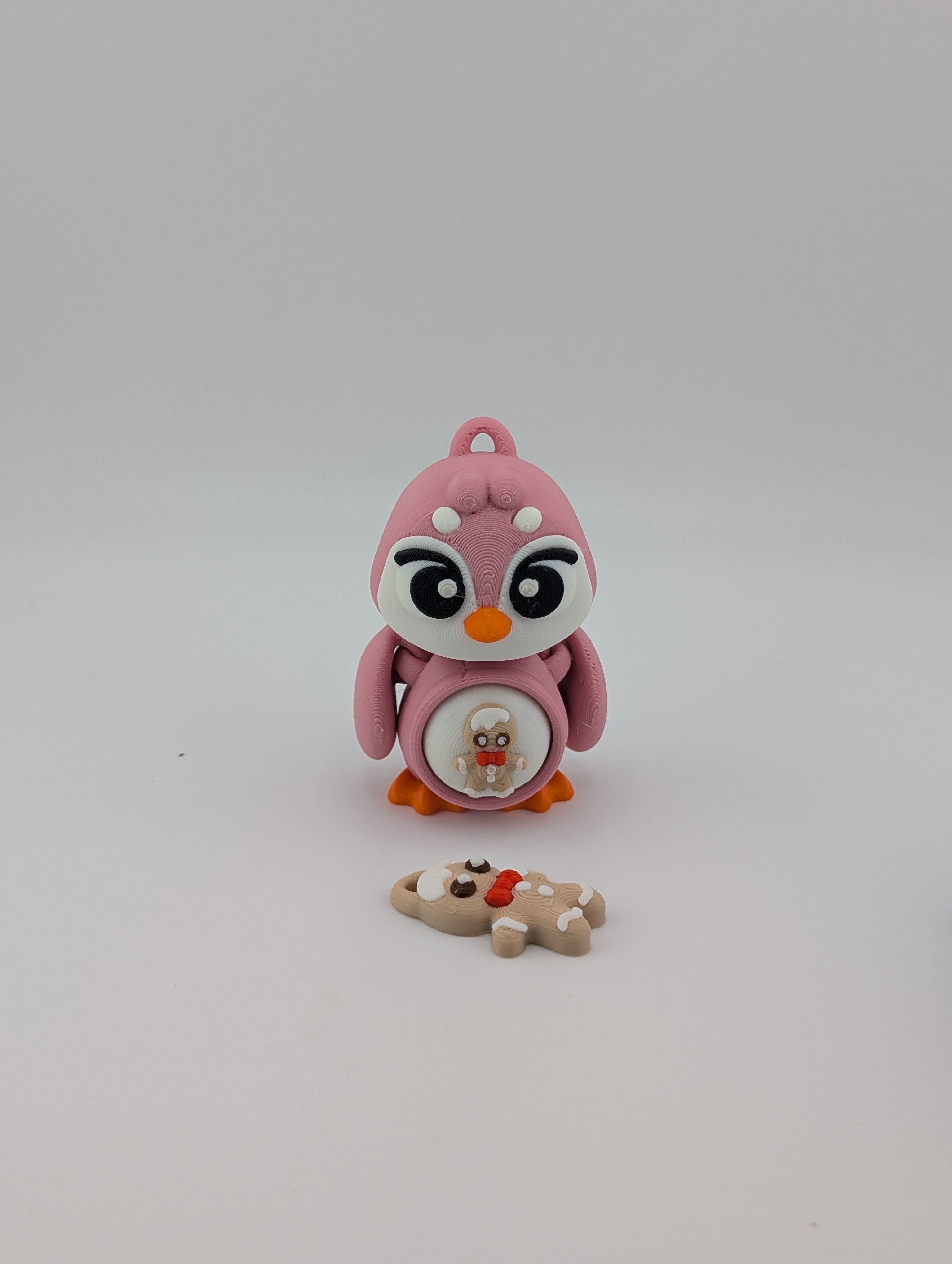 Waddle into fun with our Penguin Clicker Keychains!