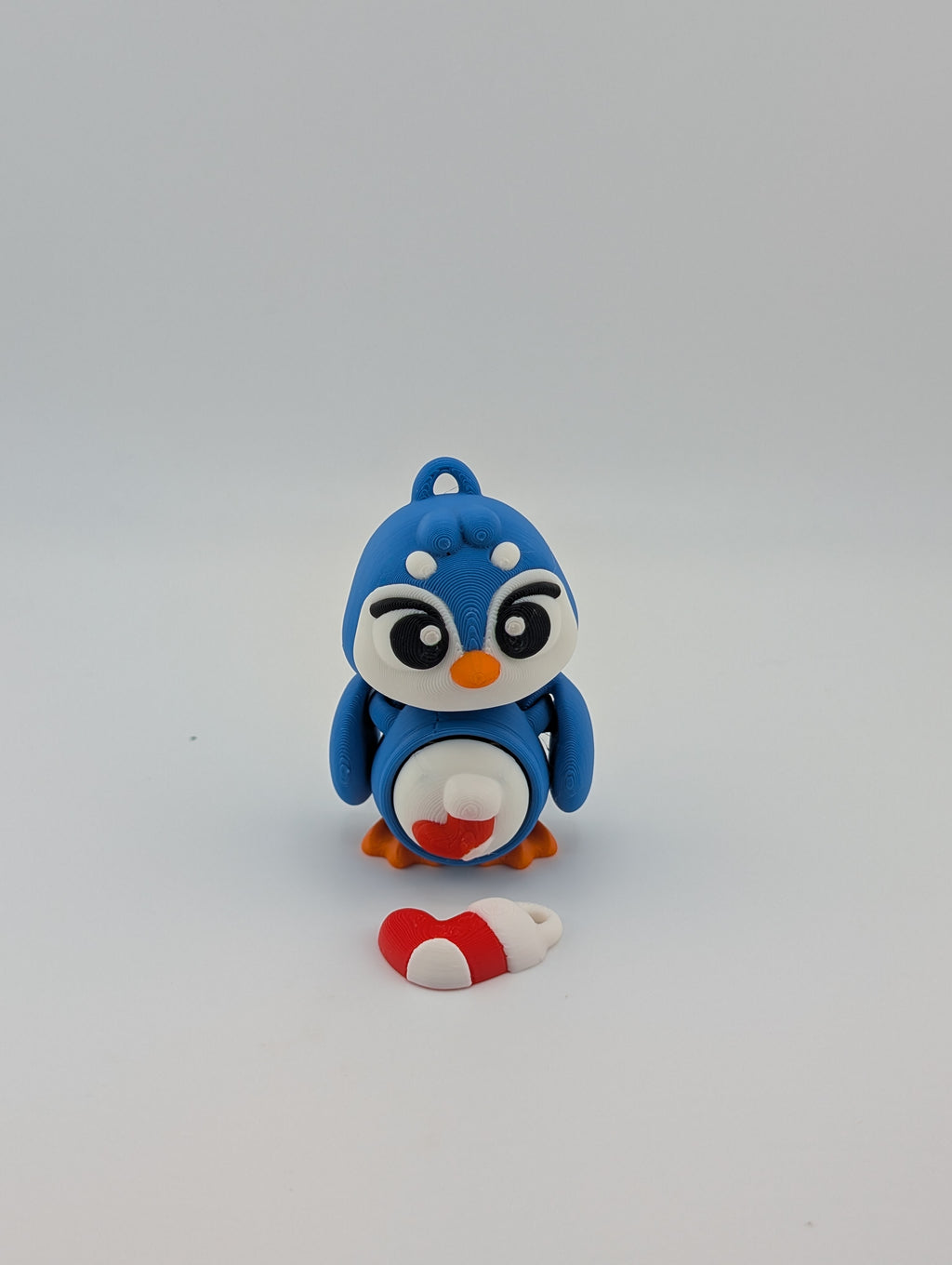 Waddle into fun with our Penguin Clicker Keychains!