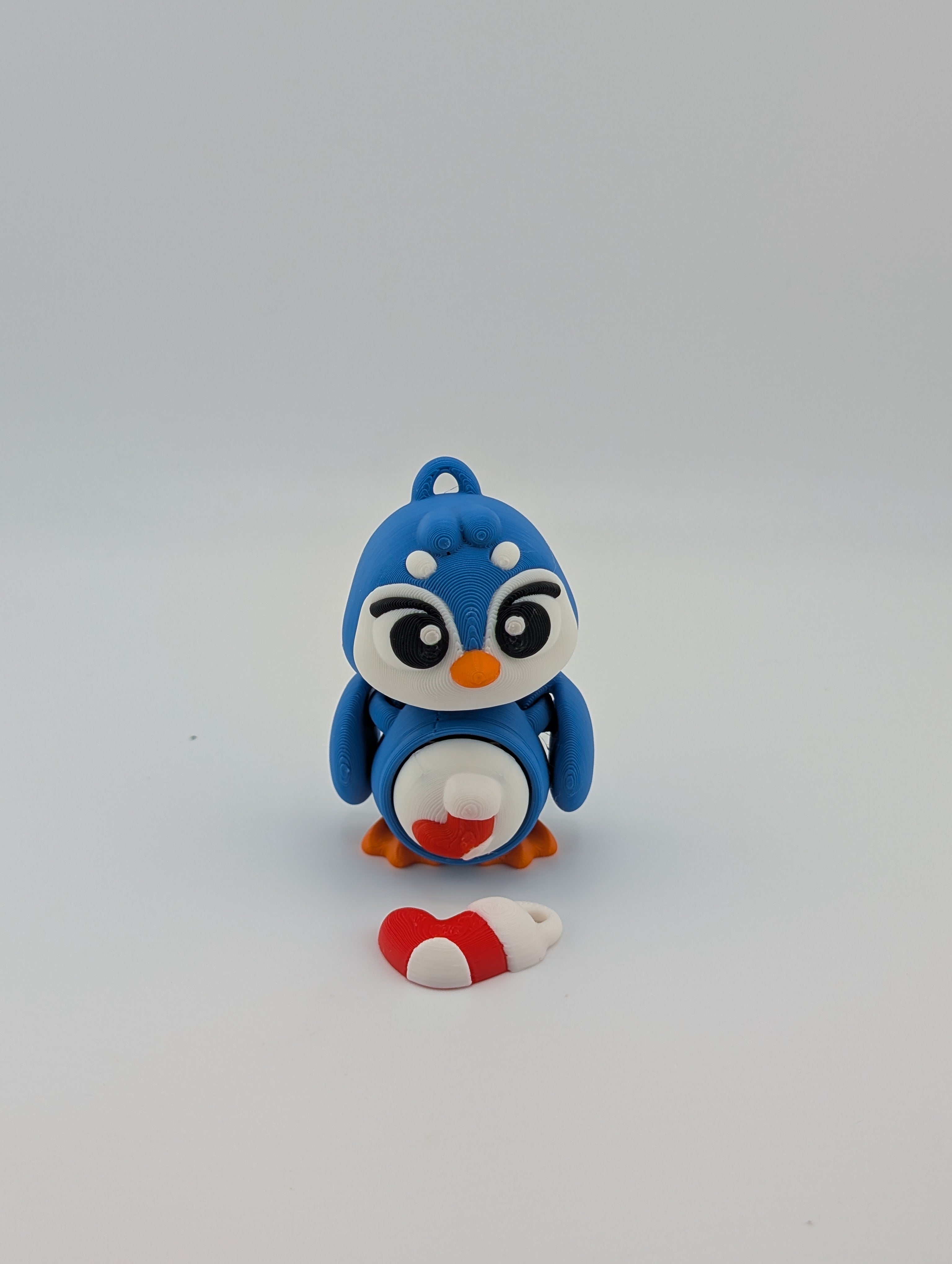 Waddle into fun with our Penguin Clicker Keychains!