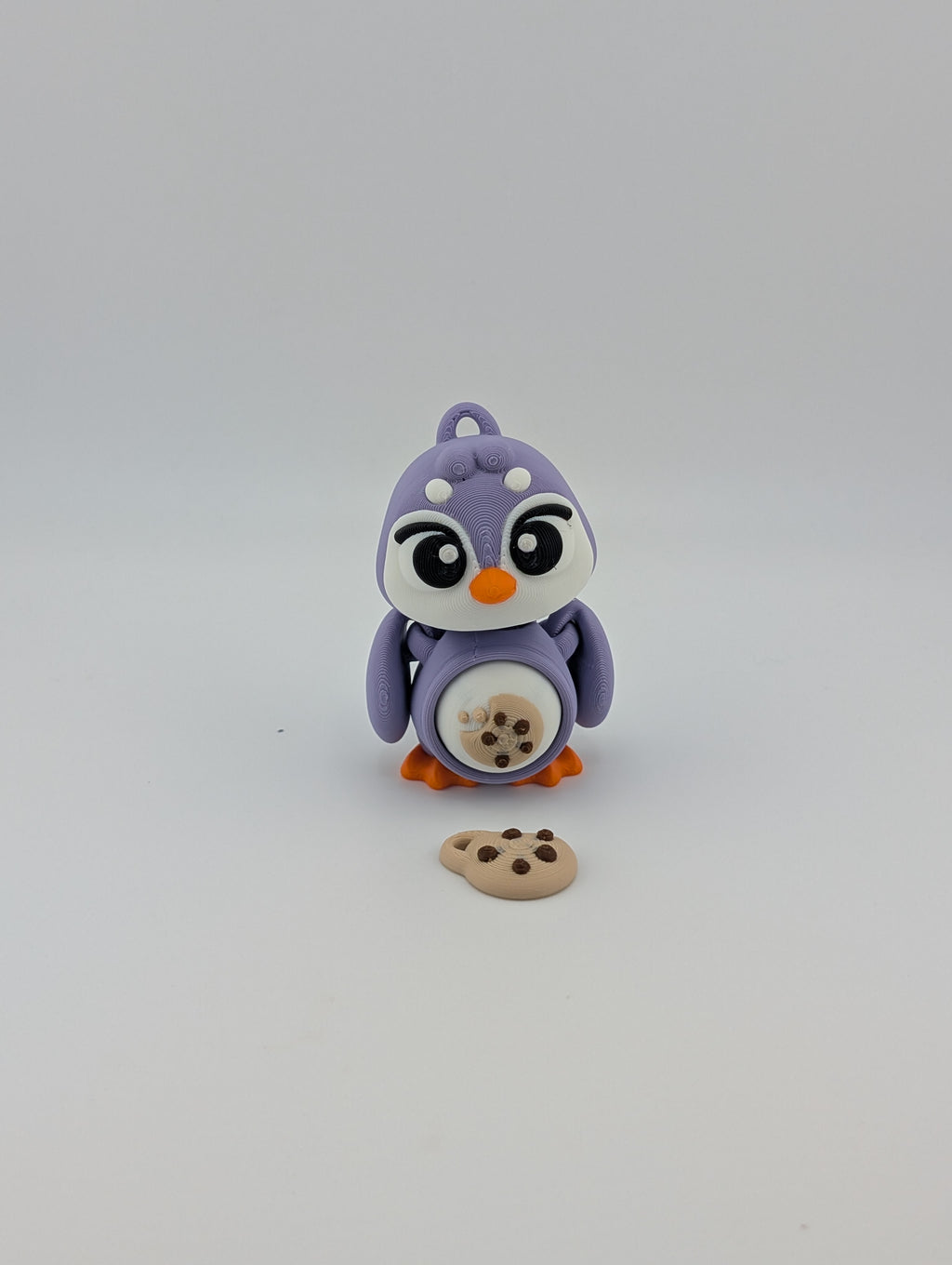 Waddle into fun with our Penguin Clicker Keychains!