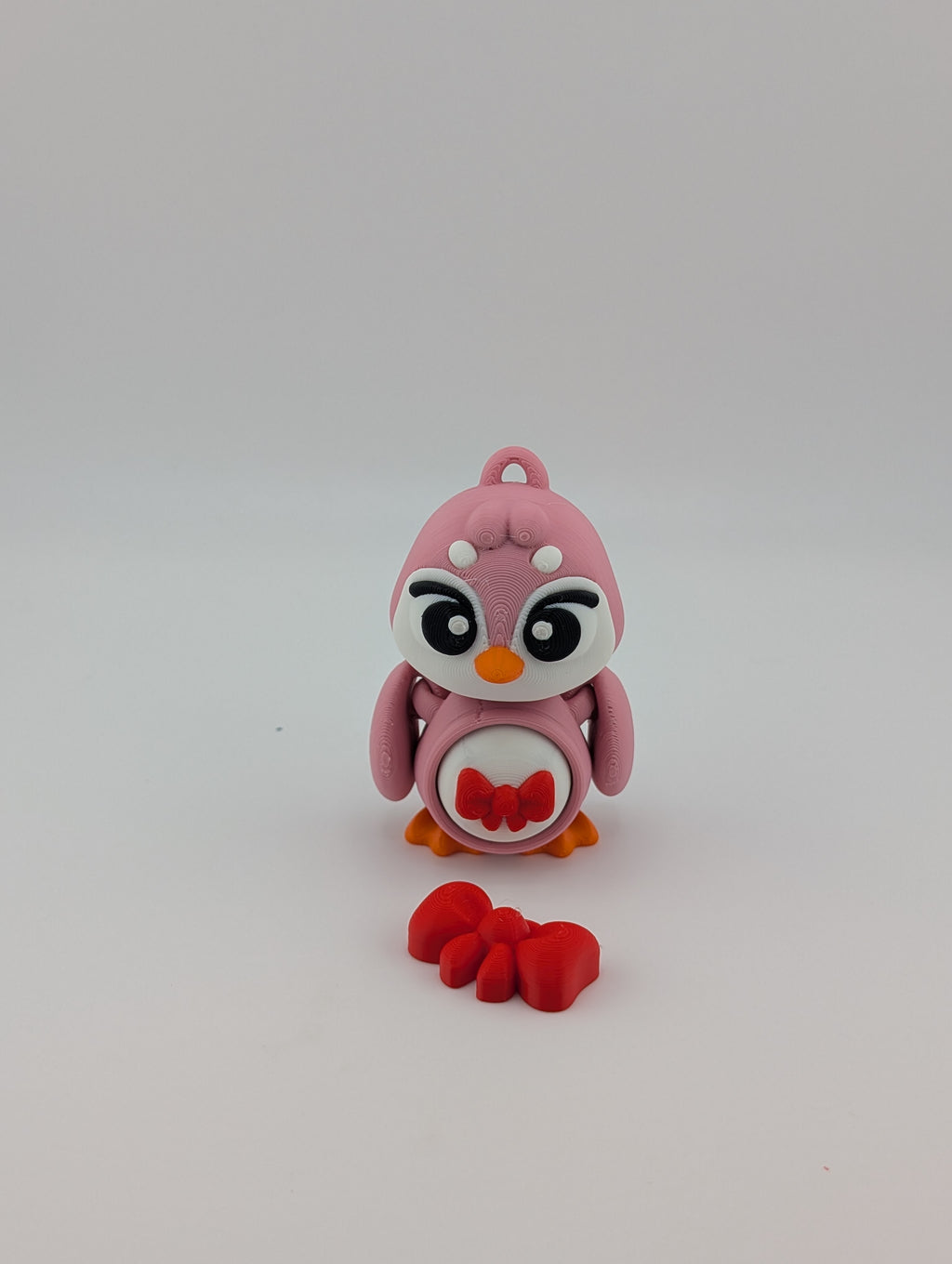Waddle into fun with our Penguin Clicker Keychains!
