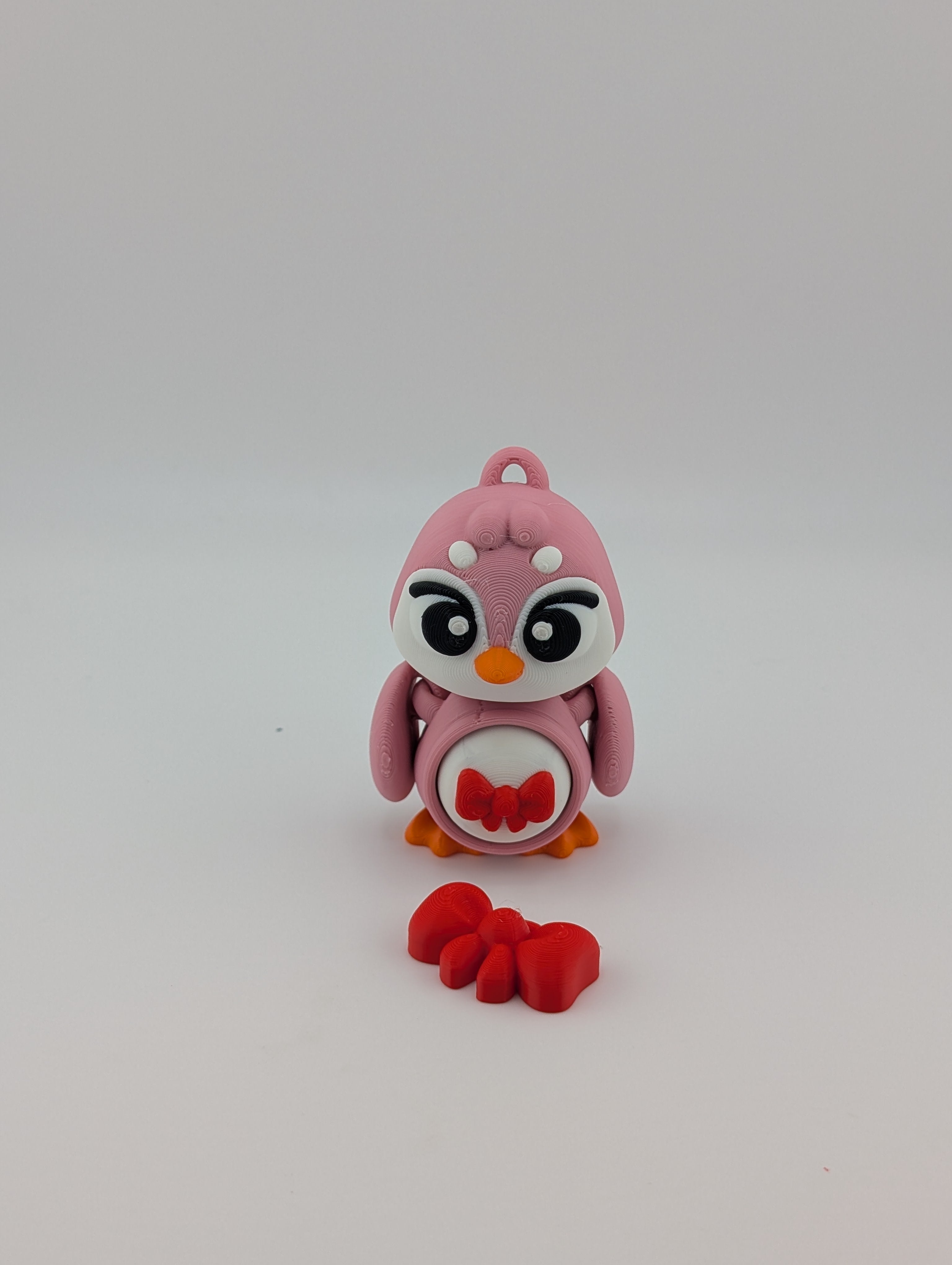 Waddle into fun with our Penguin Clicker Keychains!