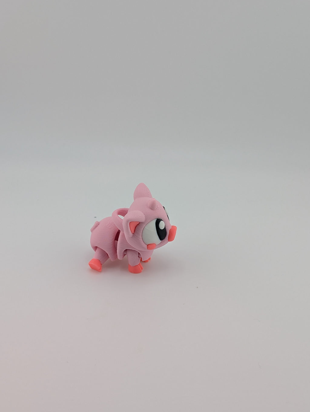 Oink-tastic charm meets fidget fun!