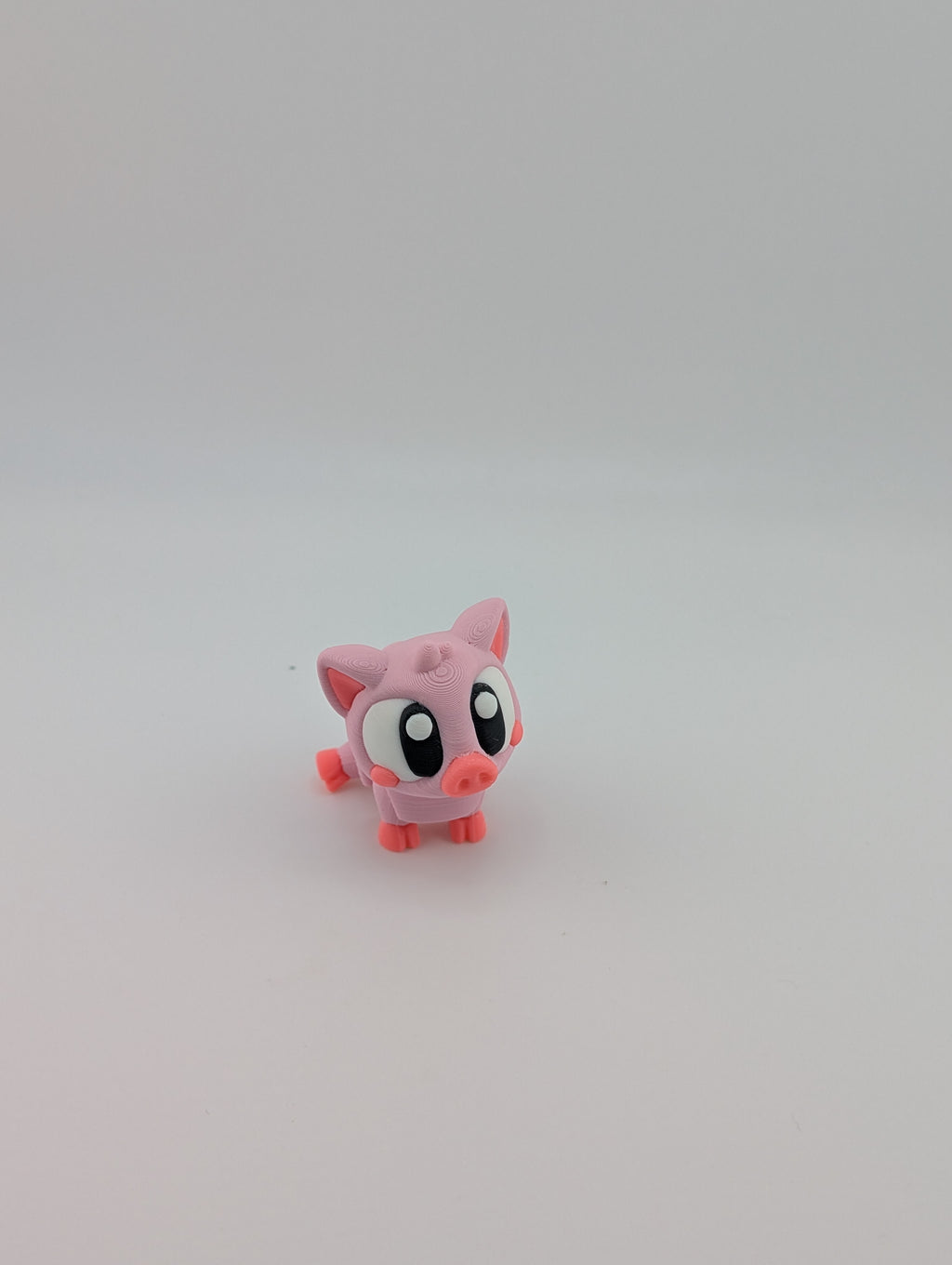 Oink-tastic charm meets fidget fun!