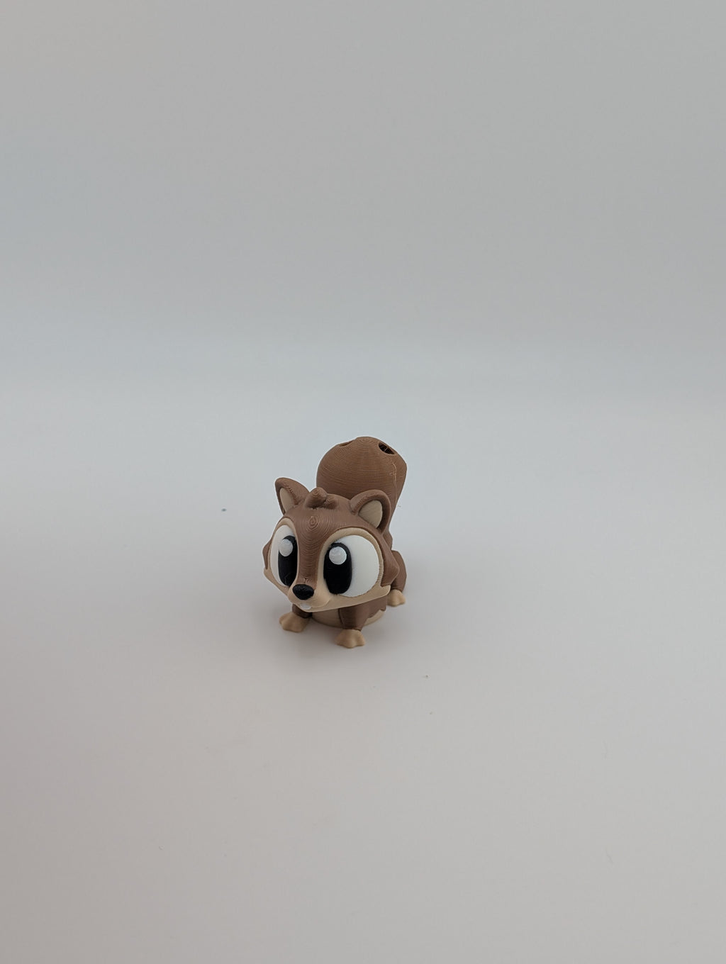 Add a dash of woodland whimsy with our Flexi Squirrel Keychain Charm!