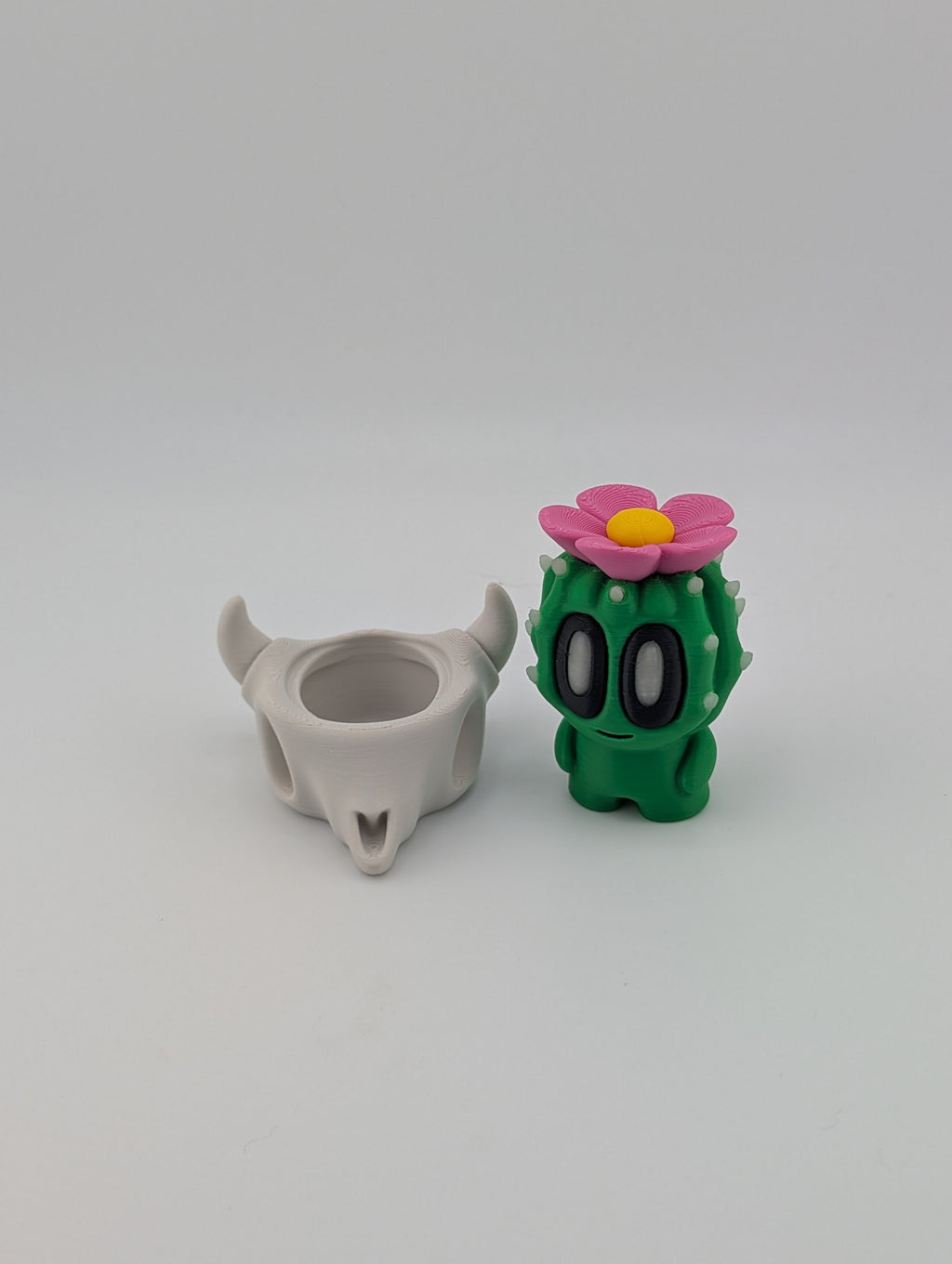 Bloblab Cactus in Skull Pot – Quirky Charm with a Glowing Floral Twist