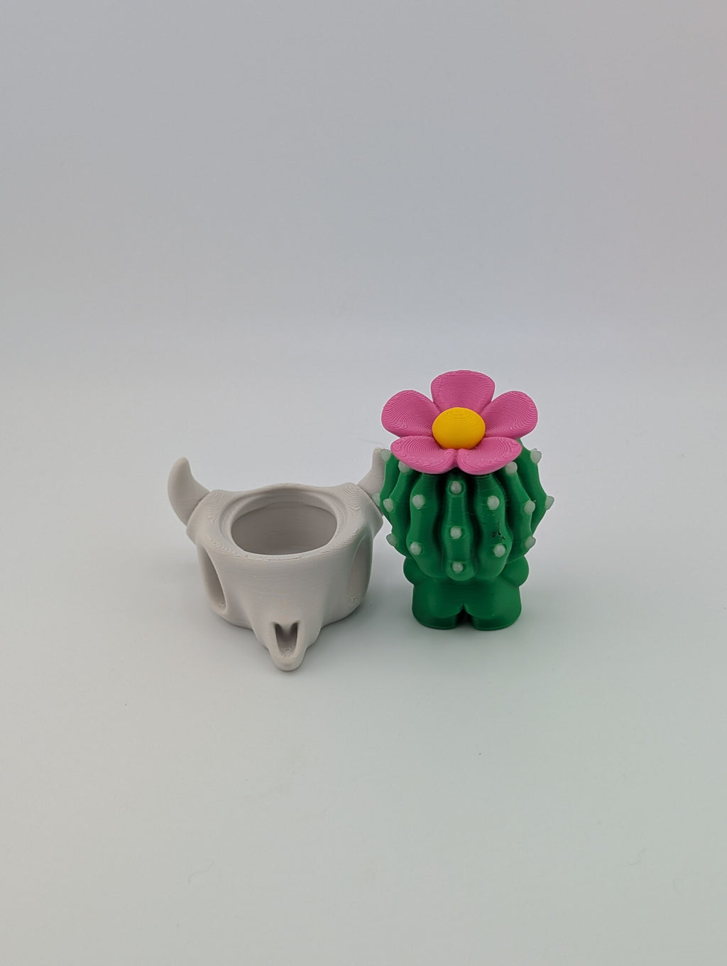 Bloblab Cactus in Skull Pot – Quirky Charm with a Glowing Floral Twist