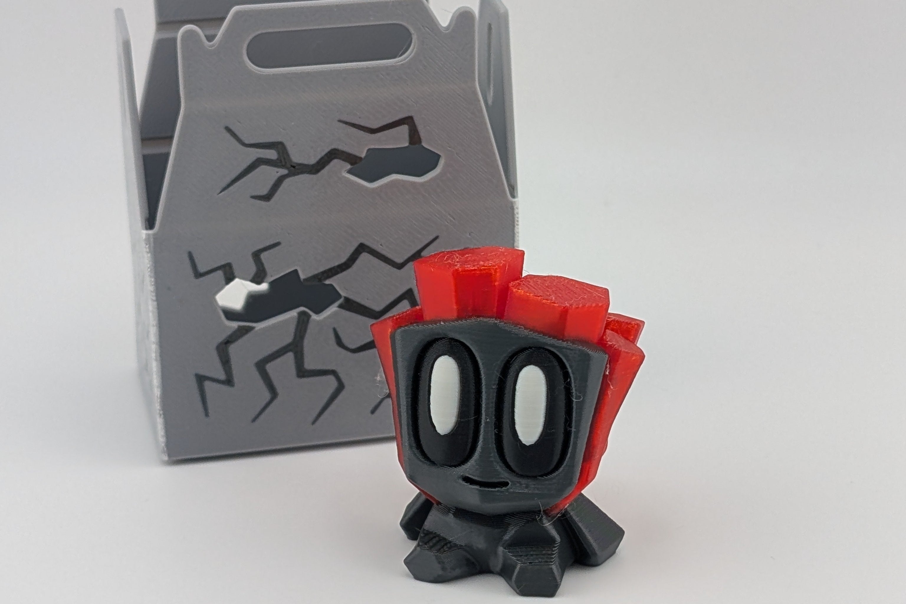 Bloblab Prehistoric Series – Crystal Rock Pet (Gray & Red Transparent PLA)