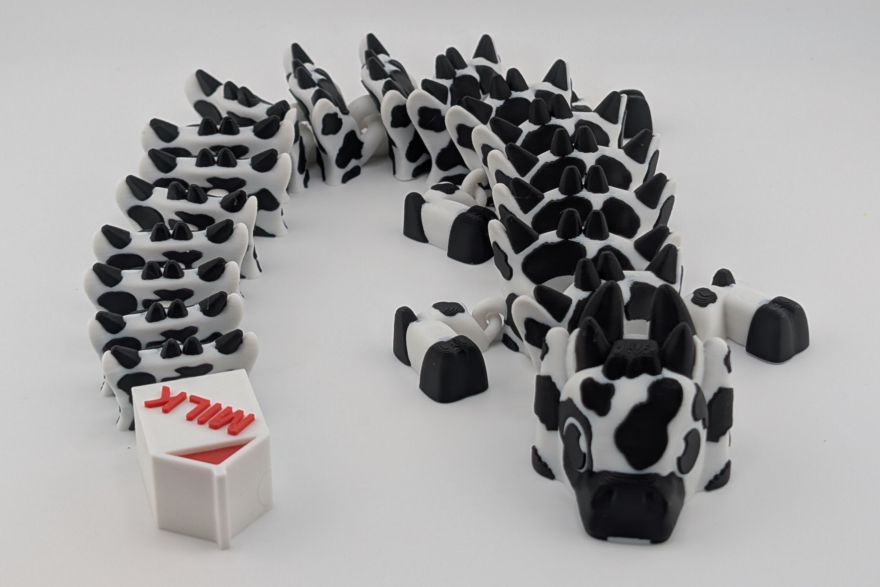 Cow Dragon – Articulated Flexi Toy with Milk Carton Tail