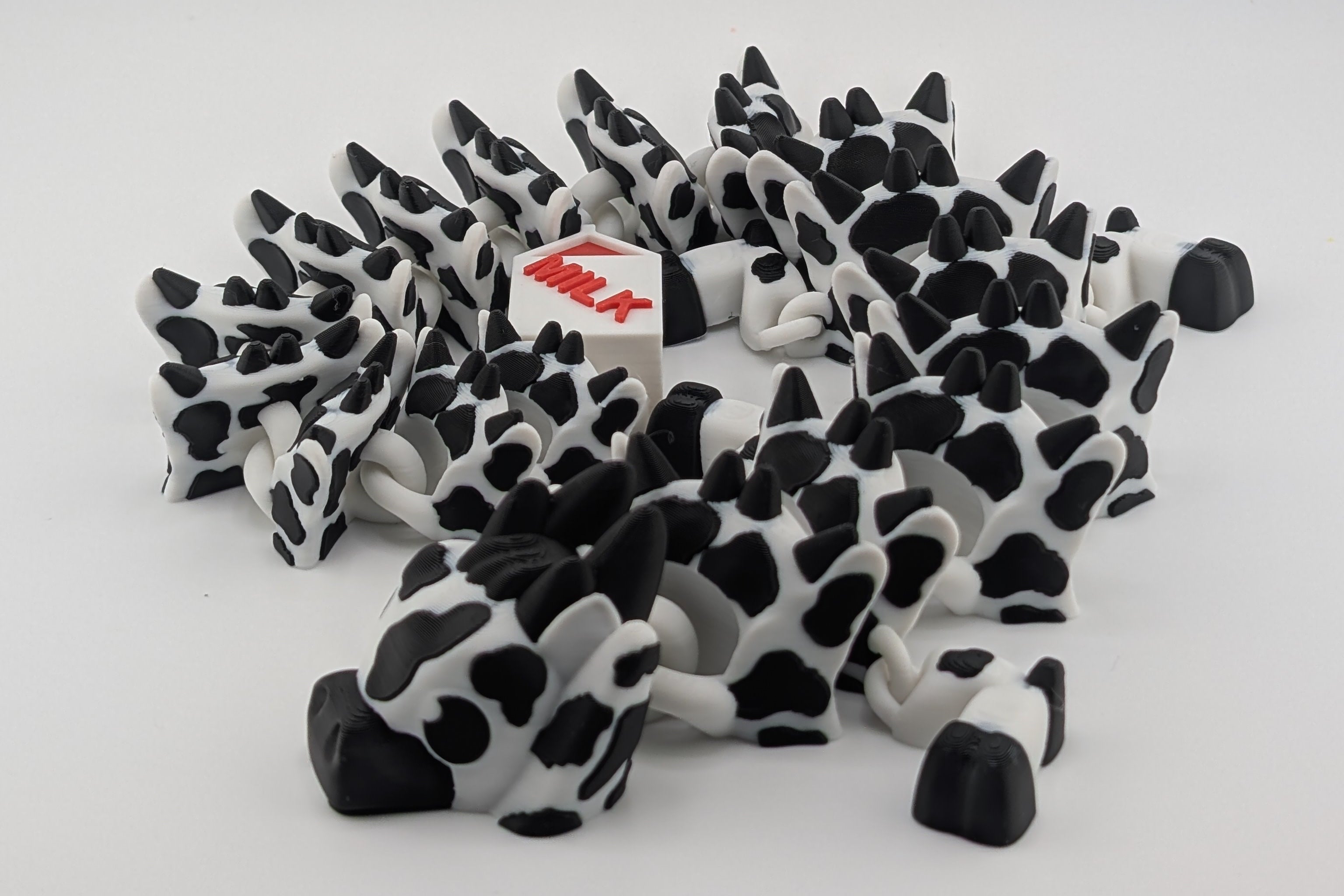Cow Dragon – Articulated Flexi Toy with Milk Carton Tail