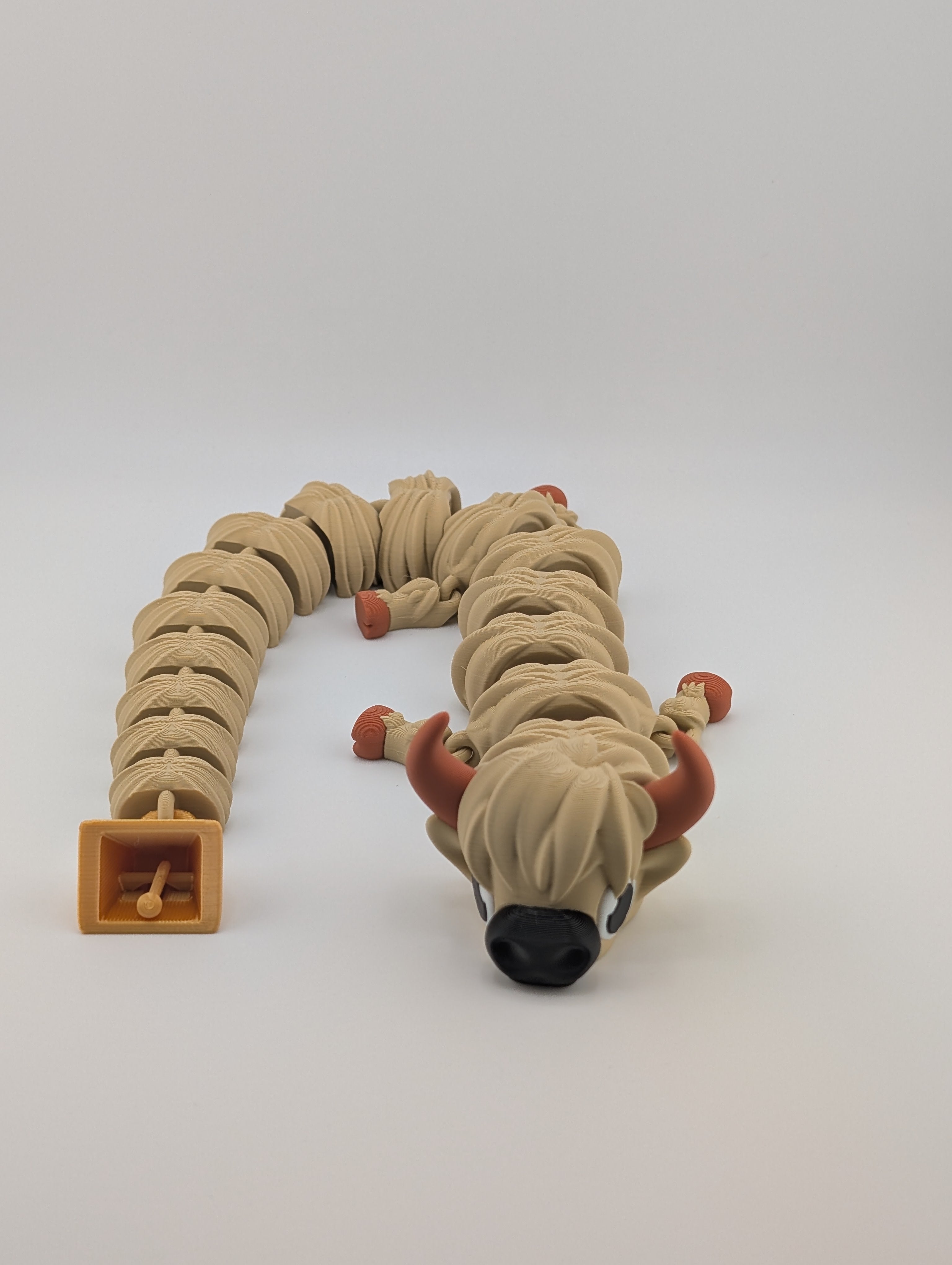 Highland Cow Flexi Dragon – 16.25" Fidget Charm