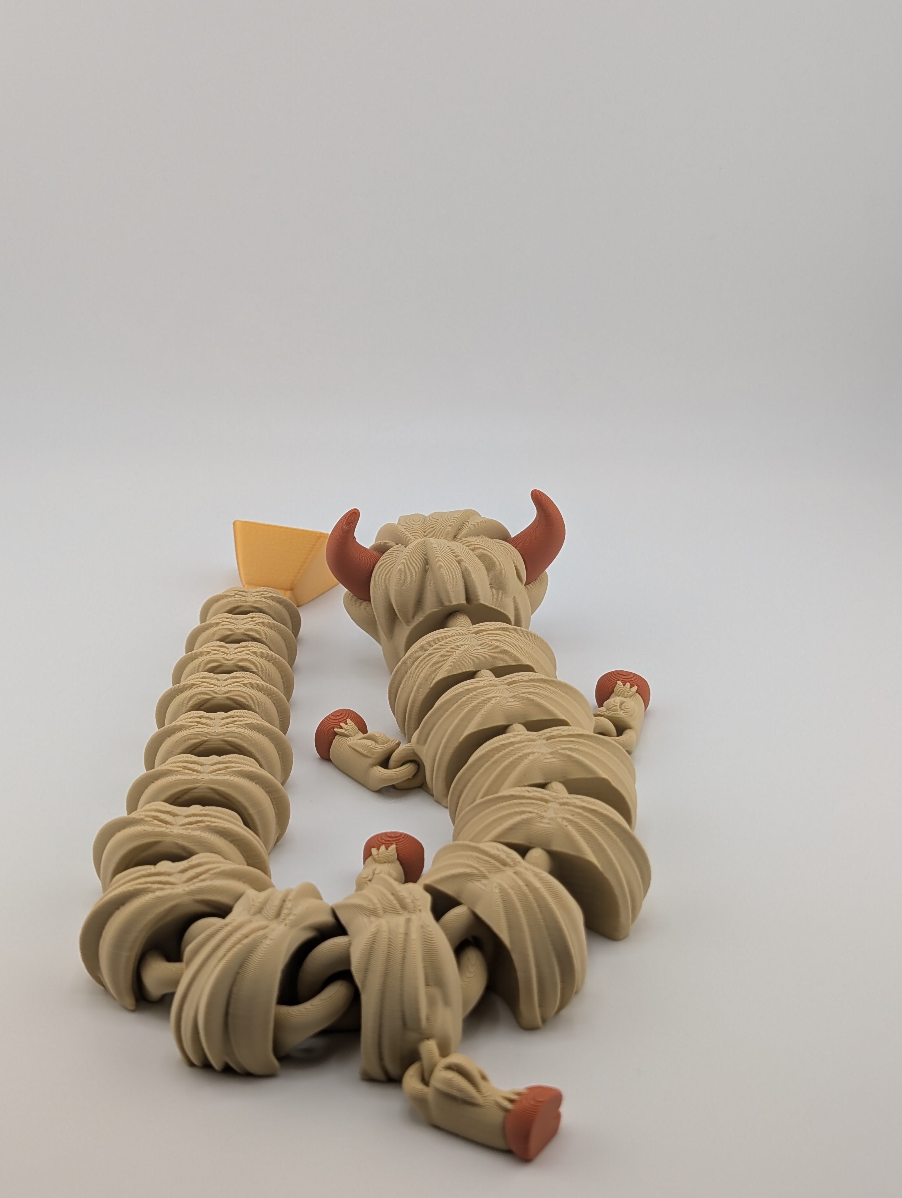 Highland Cow Flexi Dragon – 16.25" Fidget Charm