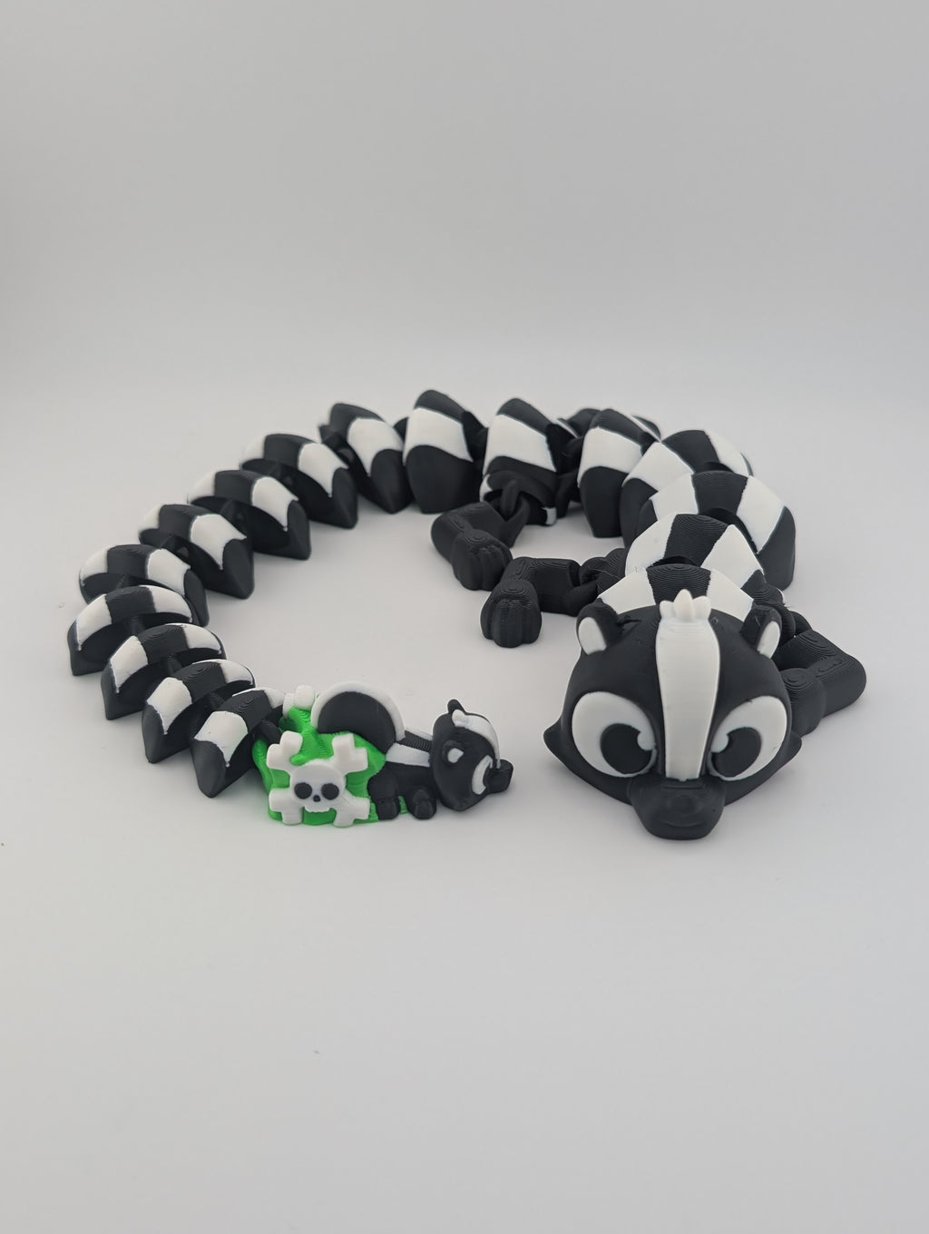 Skunk Flexi Dragon – 17.5" Articulated Fidget Friend