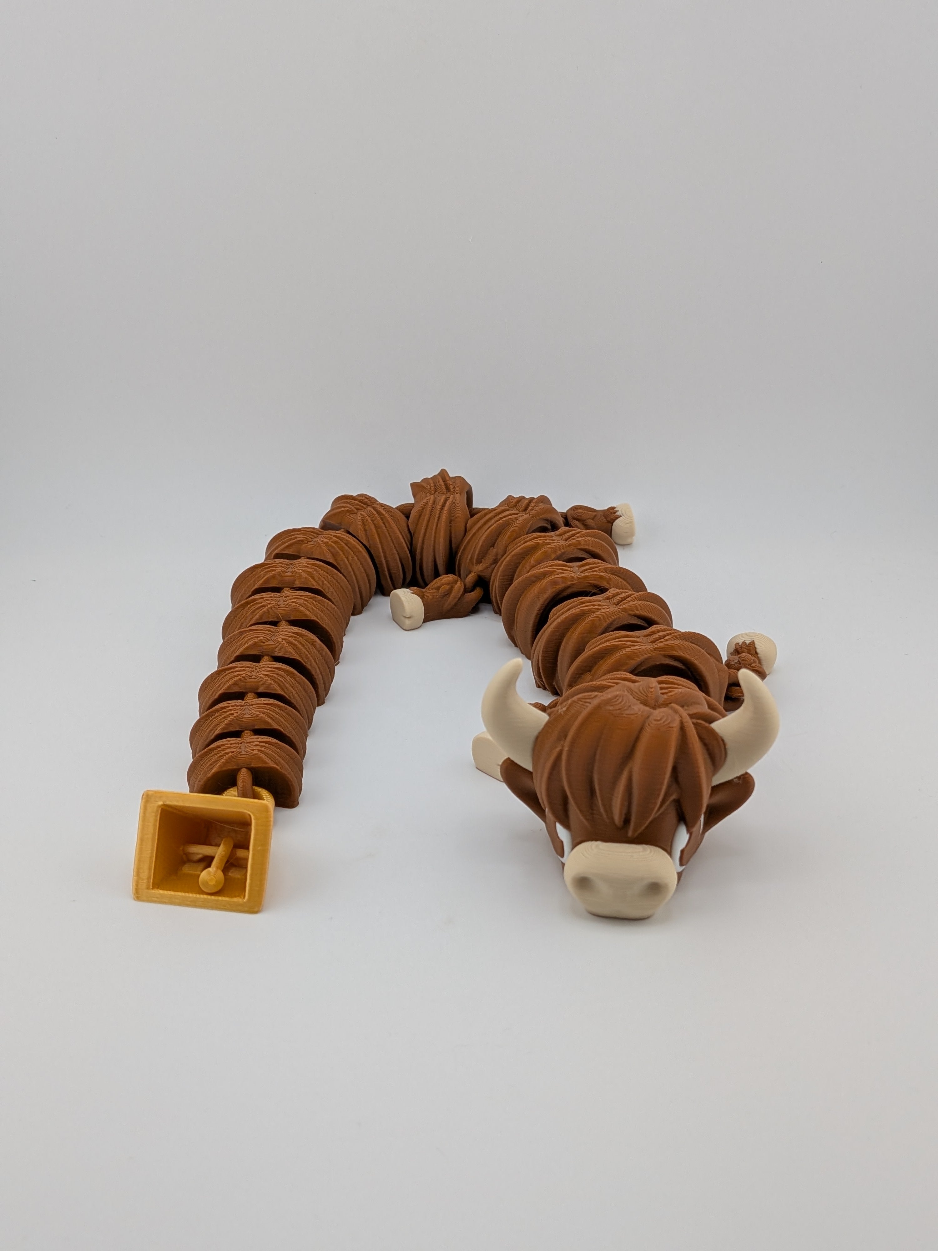 Highland Cow Flexi Dragon – 16.25" Fidget Charm