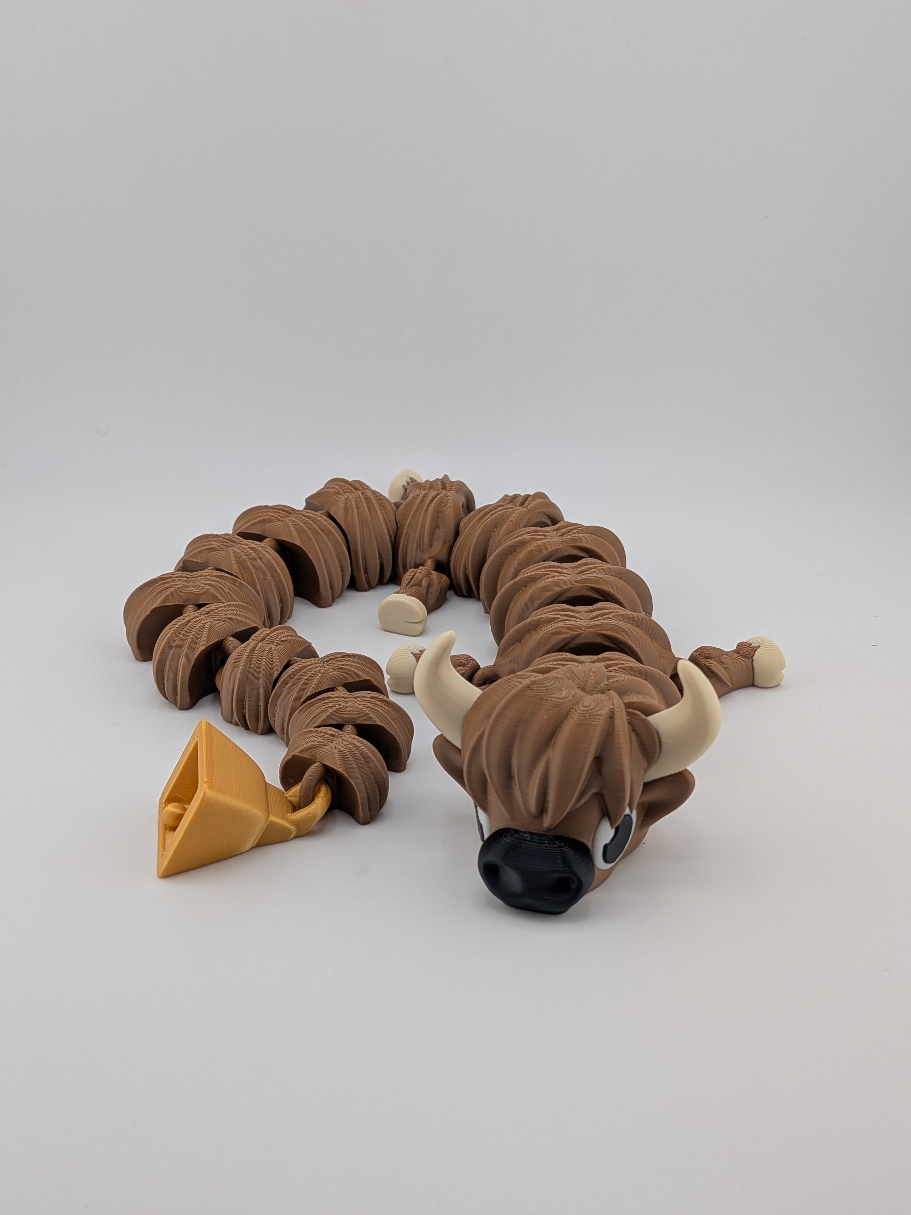 Highland Cow Flexi Dragon – 16.25" Fidget Charm