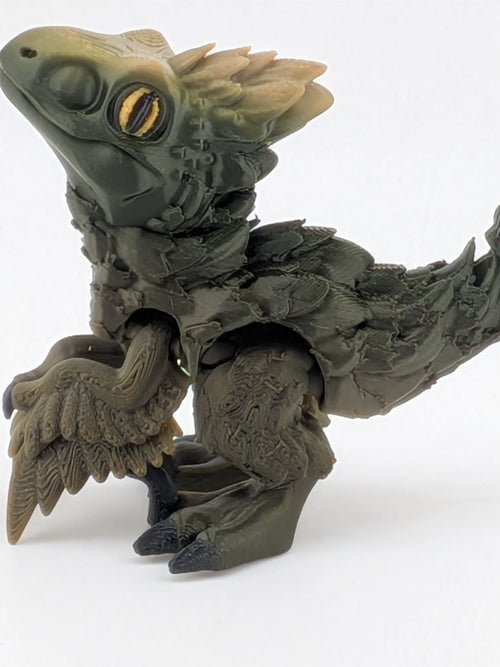 3.5 Inch Articulated Pyroraptor Dinosaur Camo and Pastel Rainbow Filament Toy
