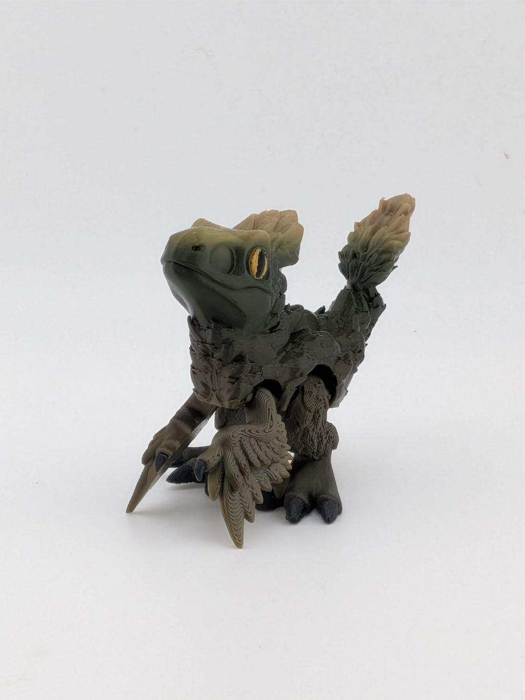 3.5 Inch Articulated Pyroraptor Dinosaur Camo and Pastel Rainbow Filament Toy