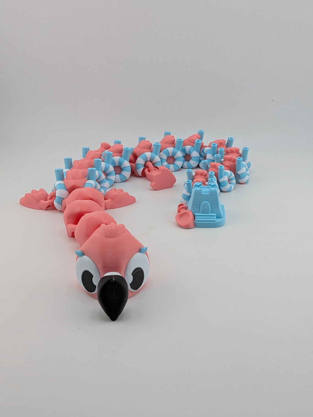 19 Inch Flamingo Beach Dragon Articulated Flexi with Sandcastle Tail