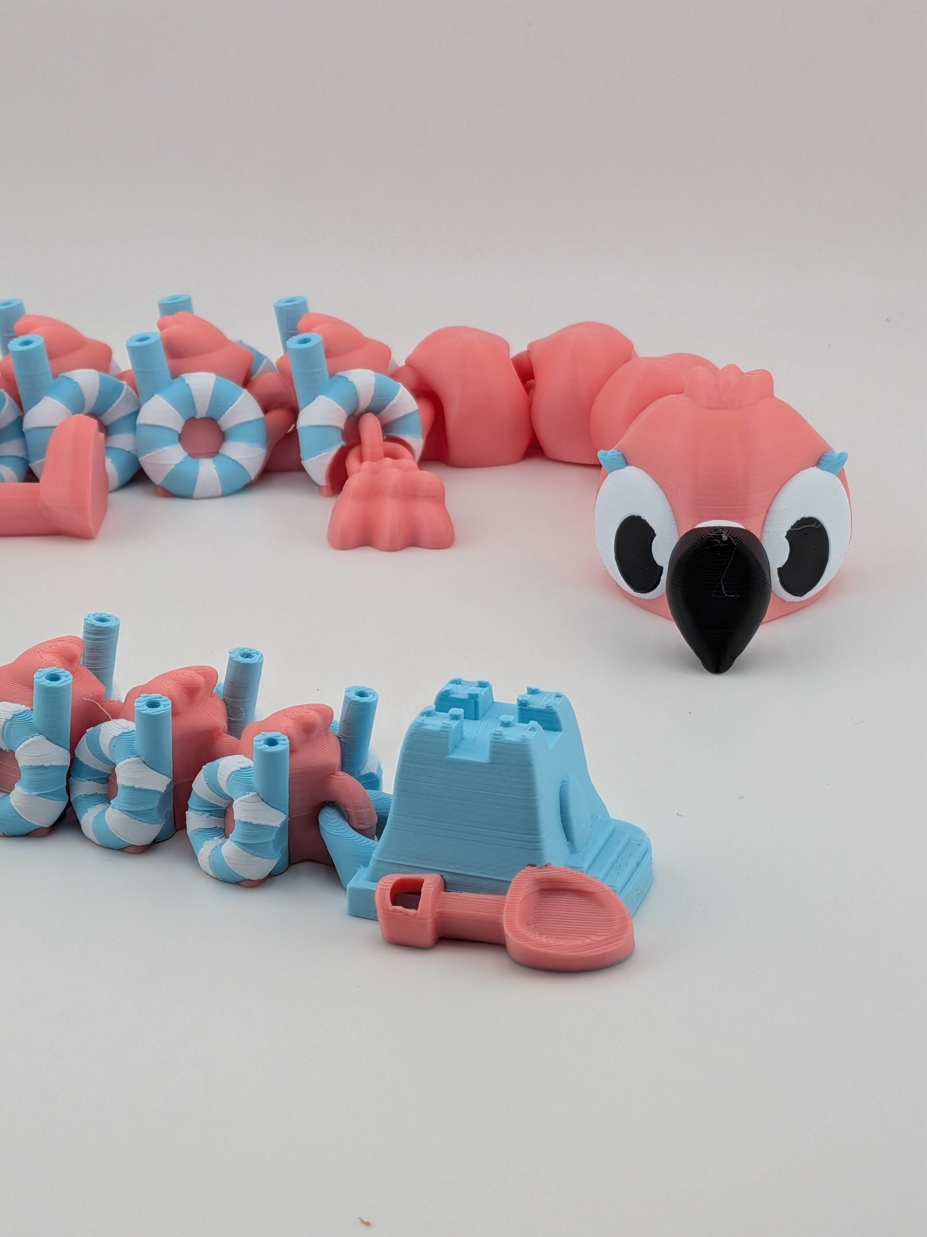 19 Inch Flamingo Beach Dragon Articulated Flexi with Sandcastle Tail