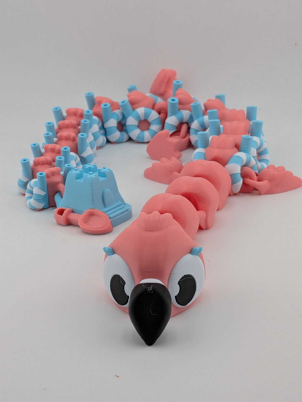 19 Inch Flamingo Beach Dragon Articulated Flexi with Sandcastle Tail