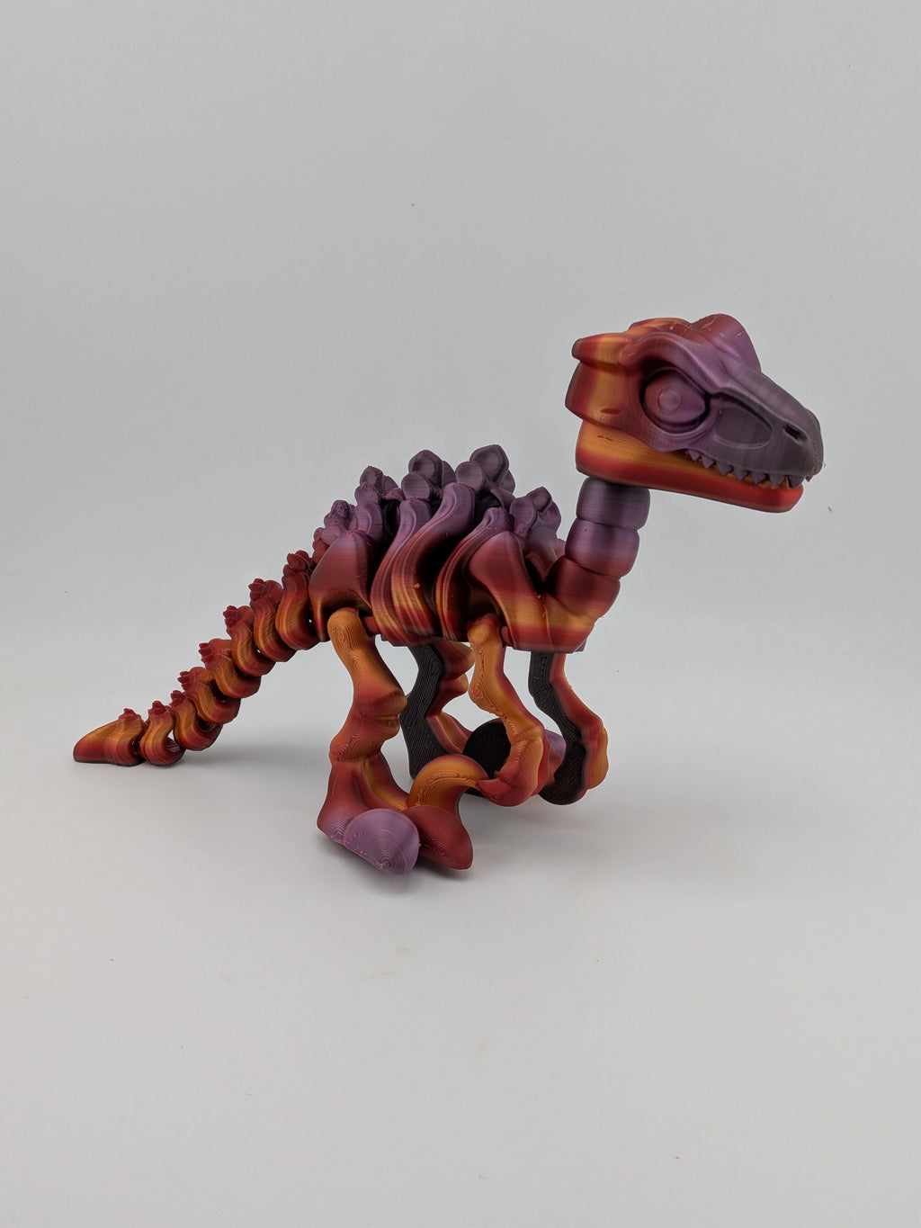 6.25 Inch Skeleton Pyroraptor Articulated Flexi Dinosaur Rainbow Bone Fidget Toy