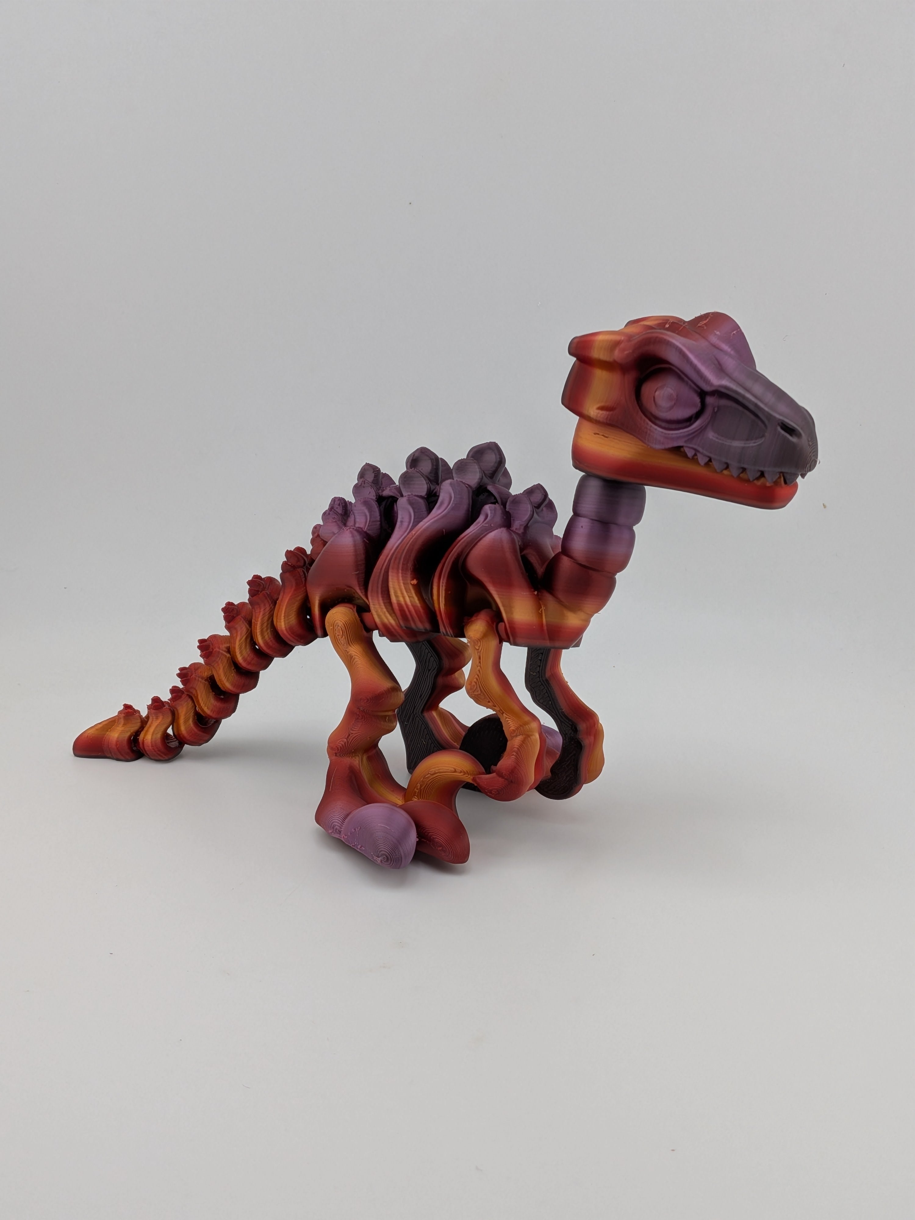 6.25 Inch Skeleton Pyroraptor Articulated Flexi Dinosaur Rainbow Bone Fidget Toy