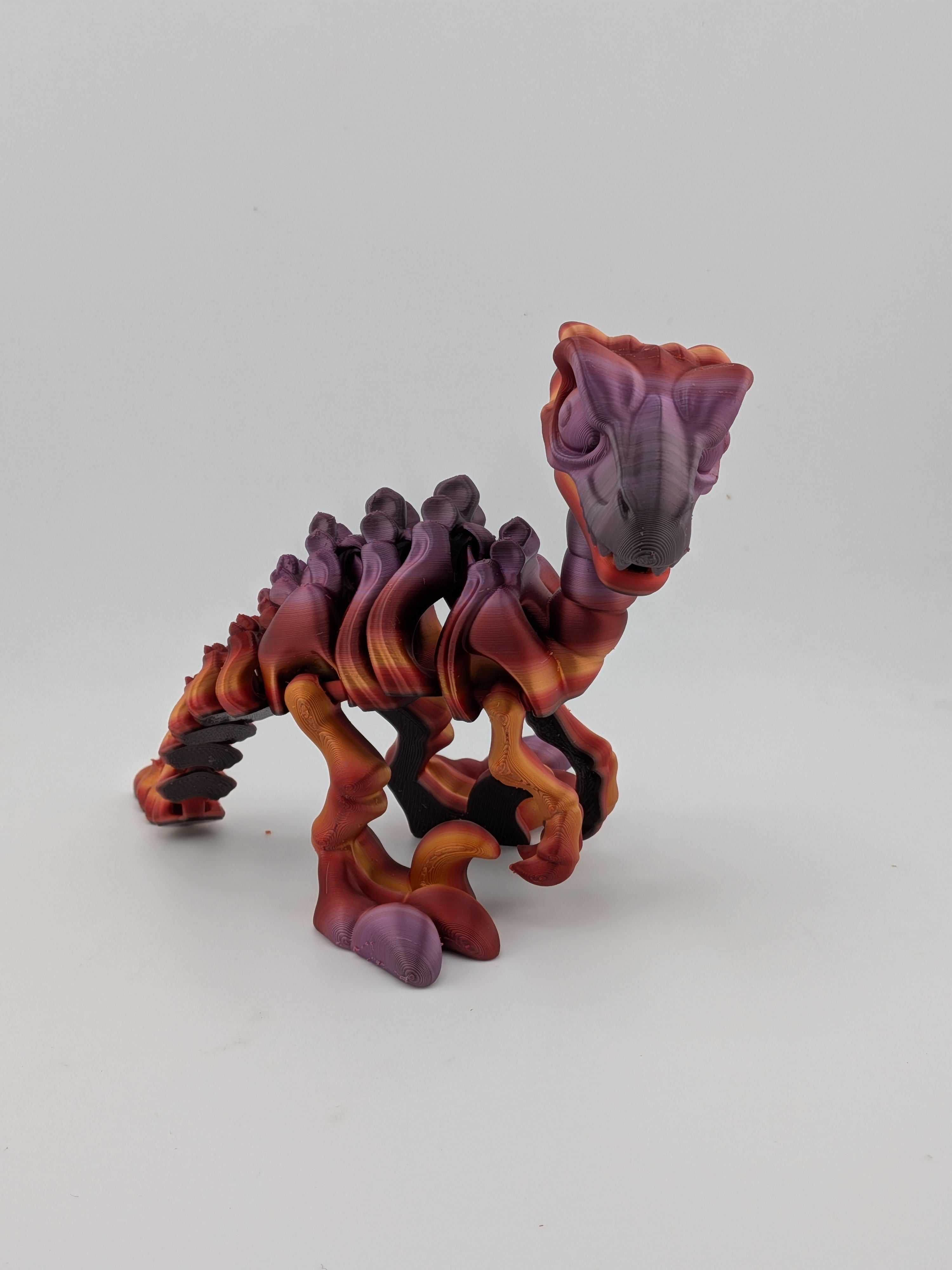 6.25 Inch Skeleton Pyroraptor Articulated Flexi Dinosaur Rainbow Bone Fidget Toy