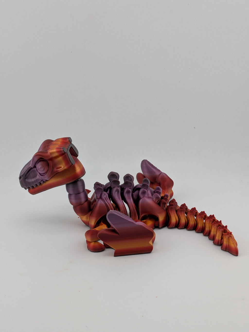 6.25 Inch Skeleton Pyroraptor Articulated Flexi Dinosaur Rainbow Bone Fidget Toy