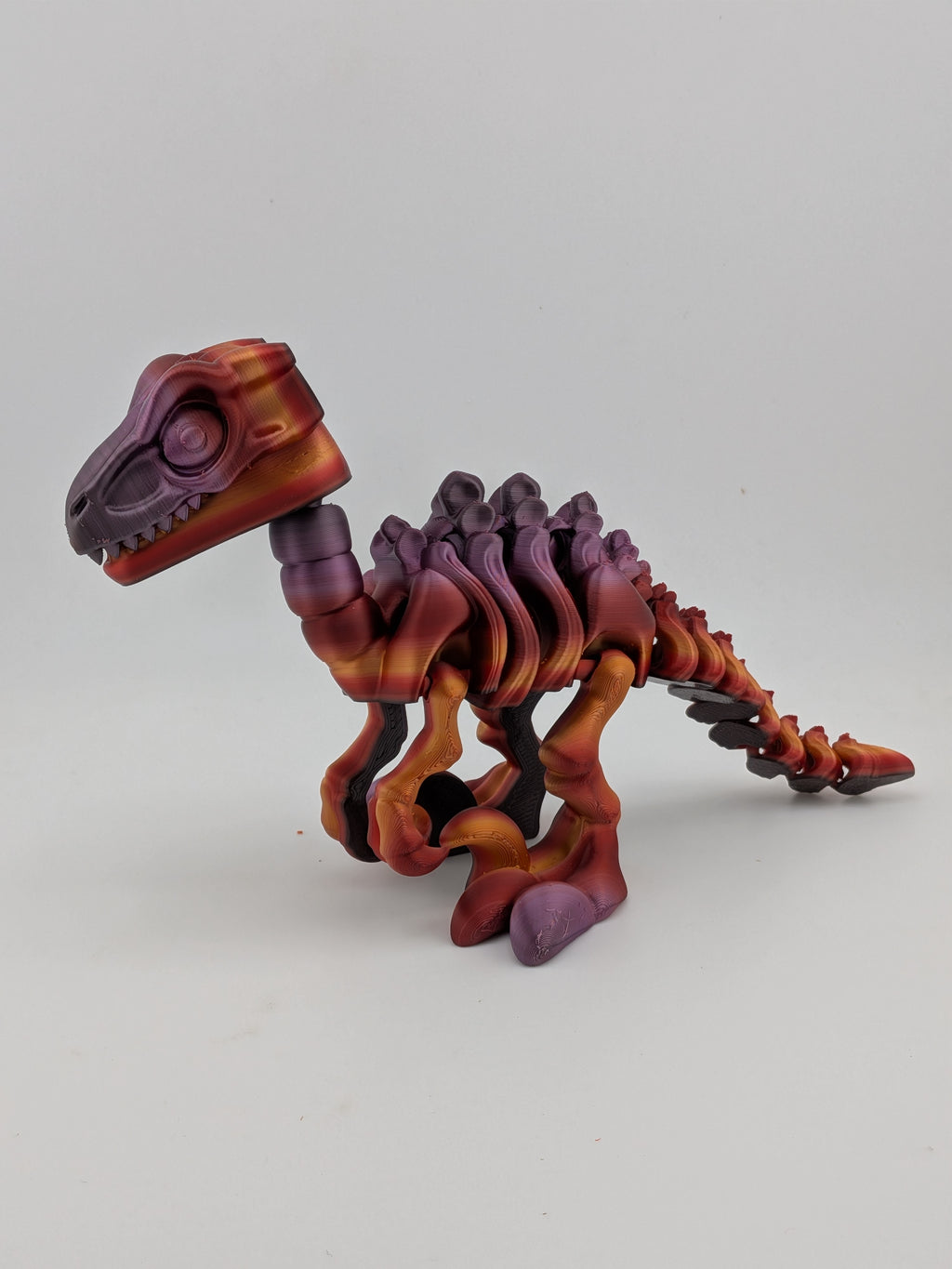 6.25 Inch Skeleton Pyroraptor Articulated Flexi Dinosaur Rainbow Bone Fidget Toy
