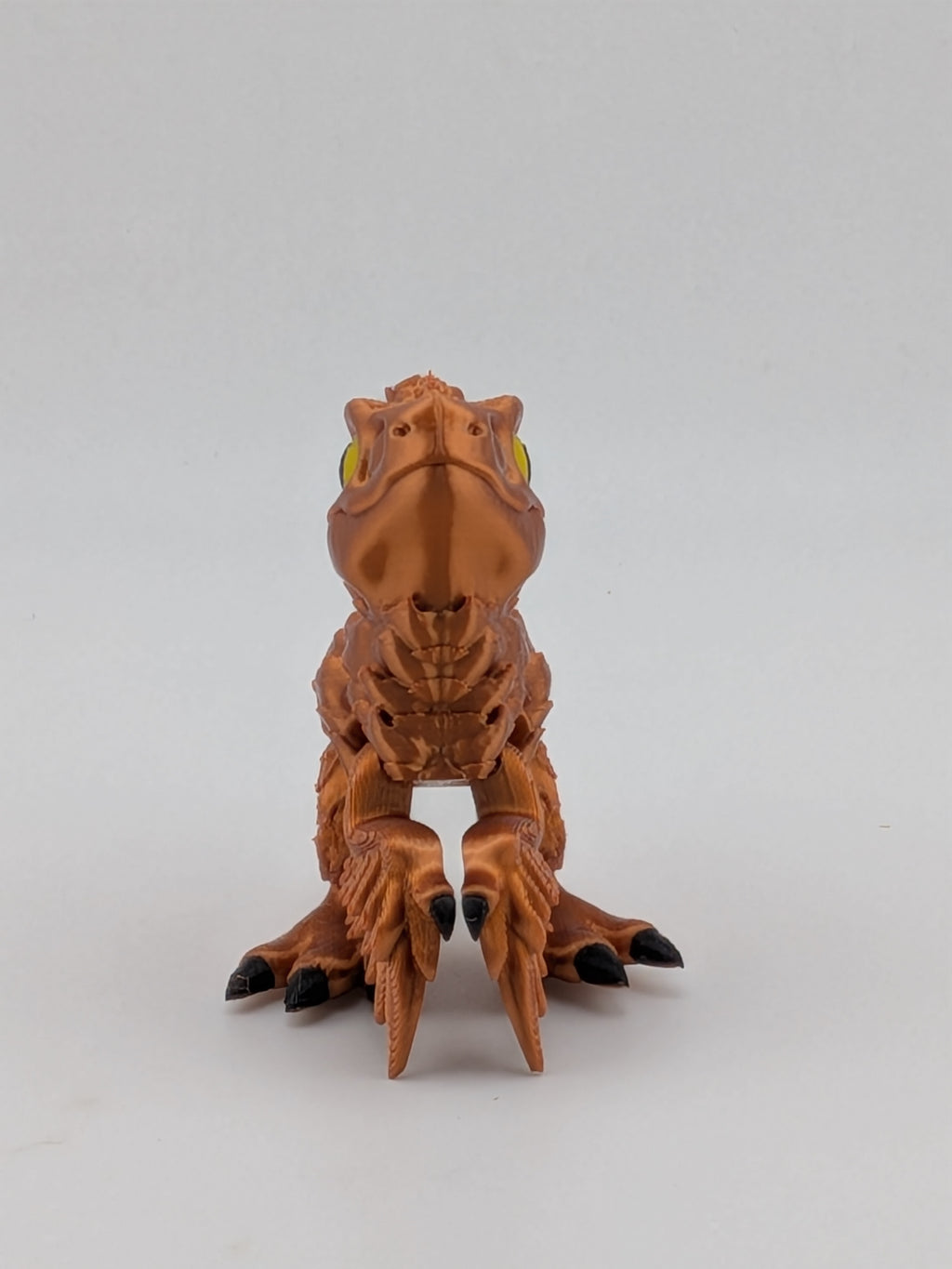 3.5 Inch Articulated Pyroraptor Dinosaur Camo and Pastel Rainbow Filament Toy
