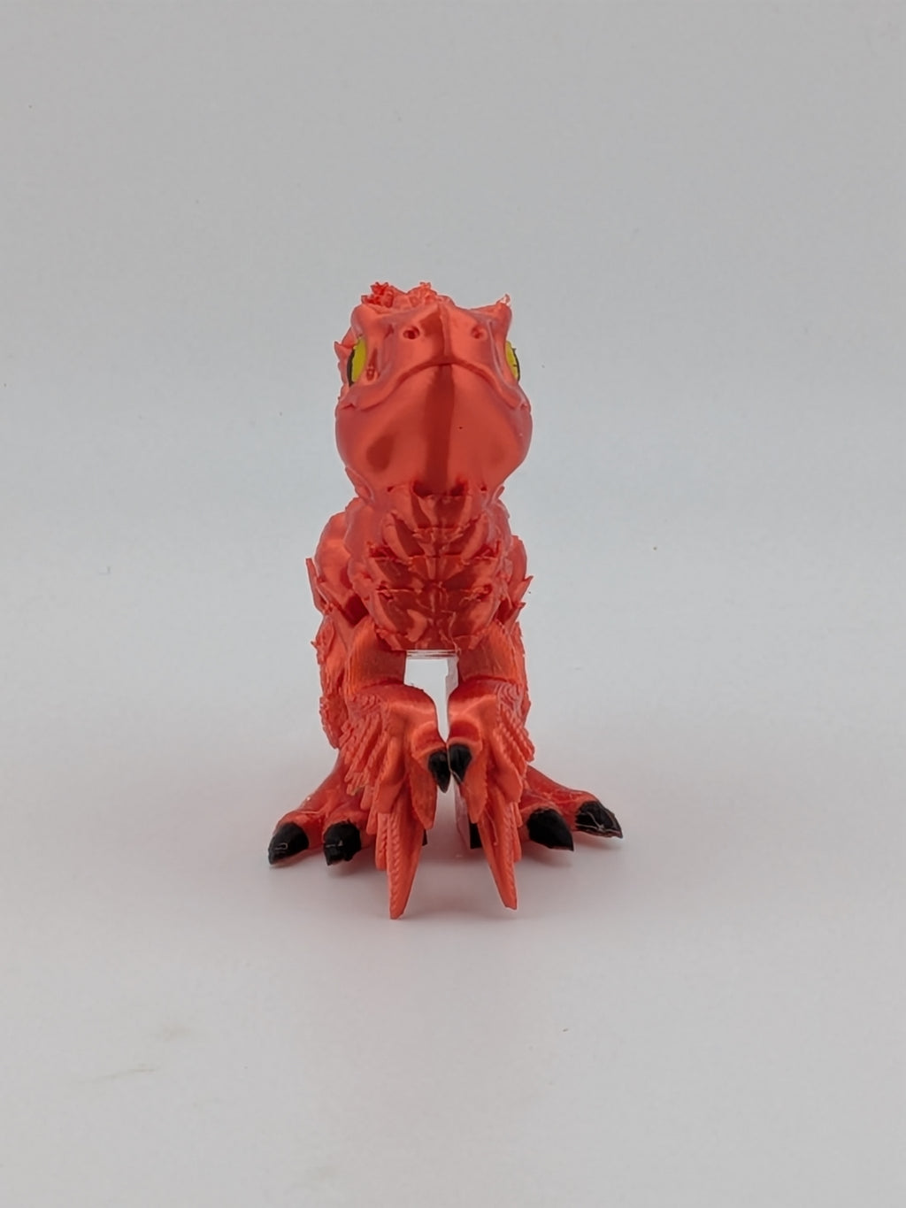 3.5 Inch Articulated Pyroraptor Dinosaur Camo and Pastel Rainbow Filament Toy