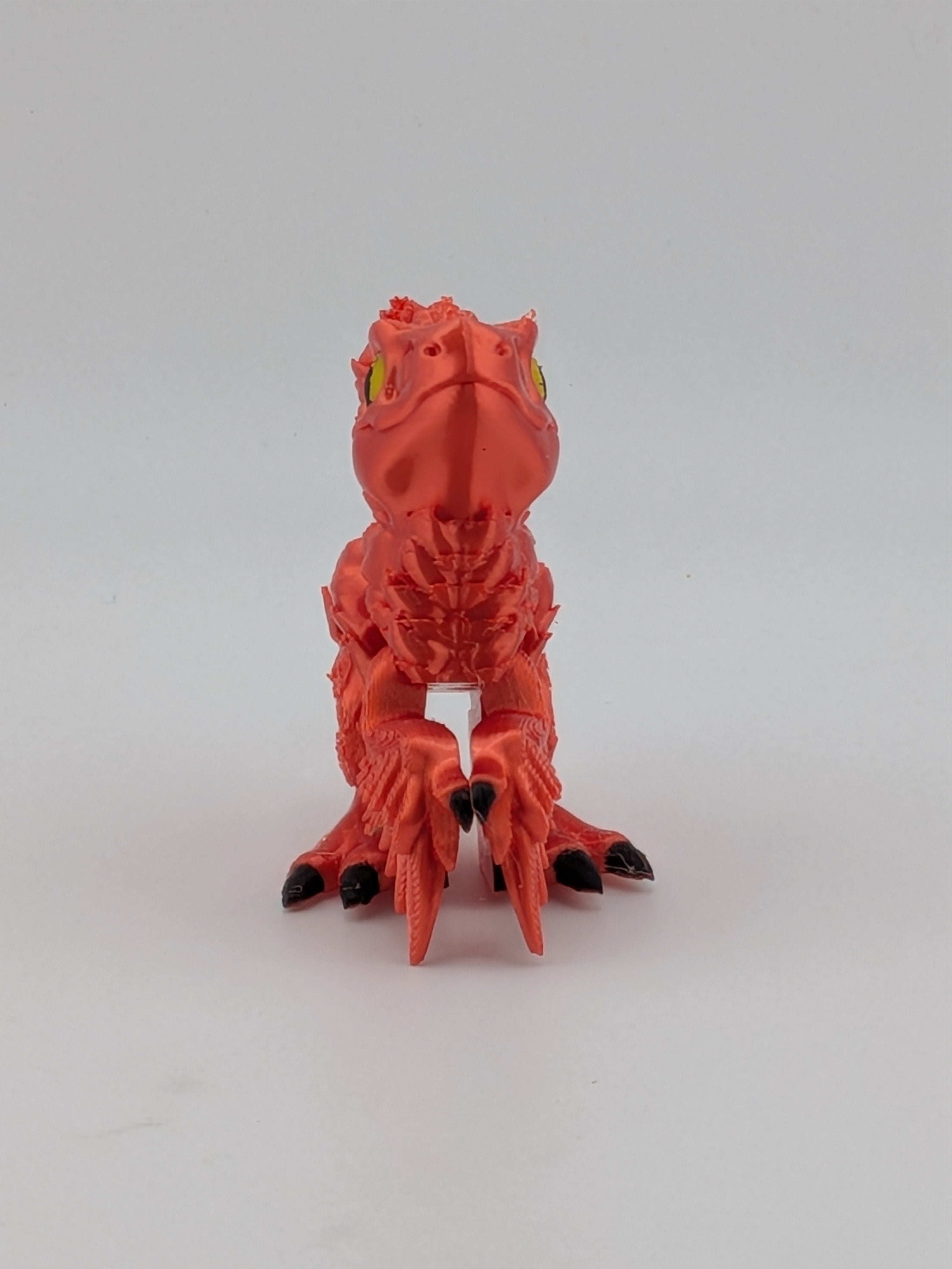 3.5 Inch Articulated Pyroraptor Dinosaur Camo and Pastel Rainbow Filament Toy