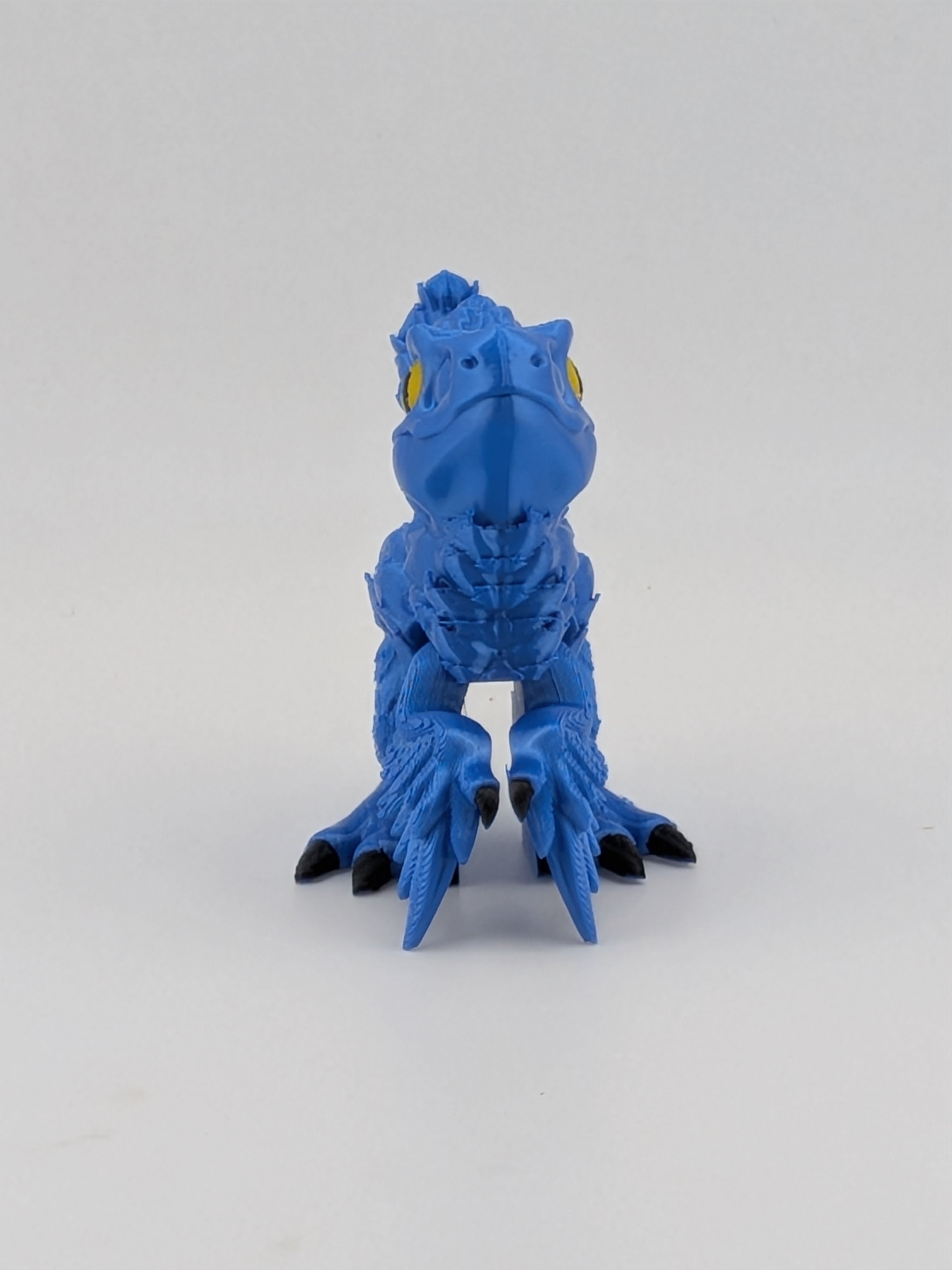 3.5 Inch Articulated Pyroraptor Dinosaur Camo and Pastel Rainbow Filament Toy