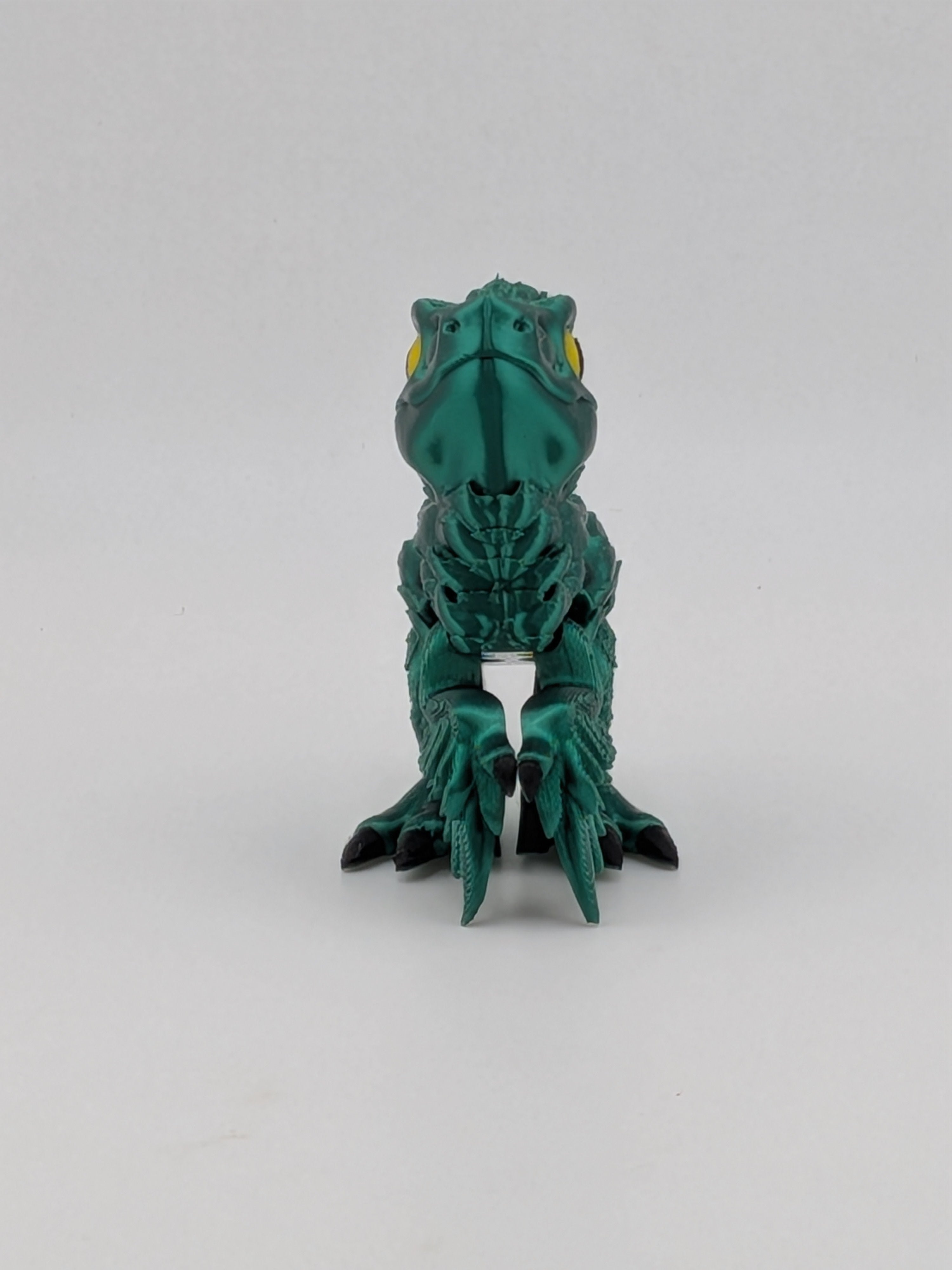 3.5 Inch Articulated Pyroraptor Dinosaur Camo and Pastel Rainbow Filament Toy