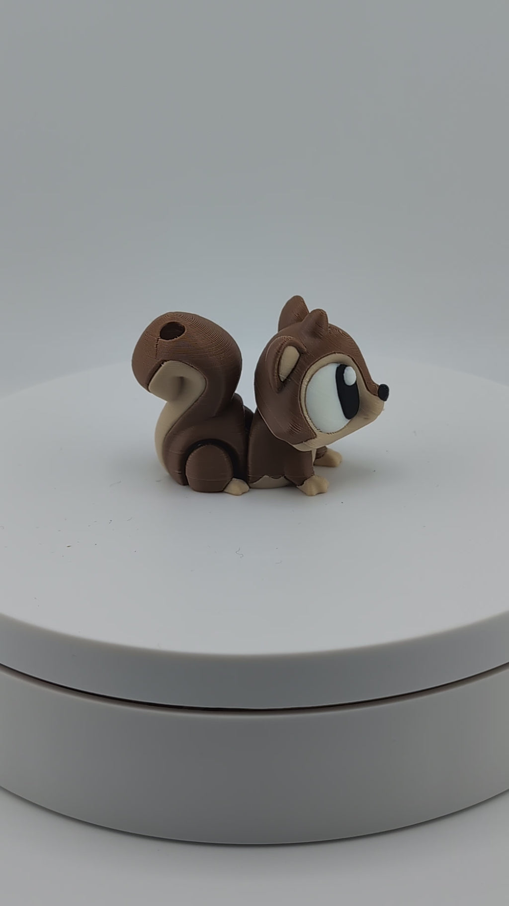 Add a dash of woodland whimsy with our Flexi Squirrel Keychain Charm!