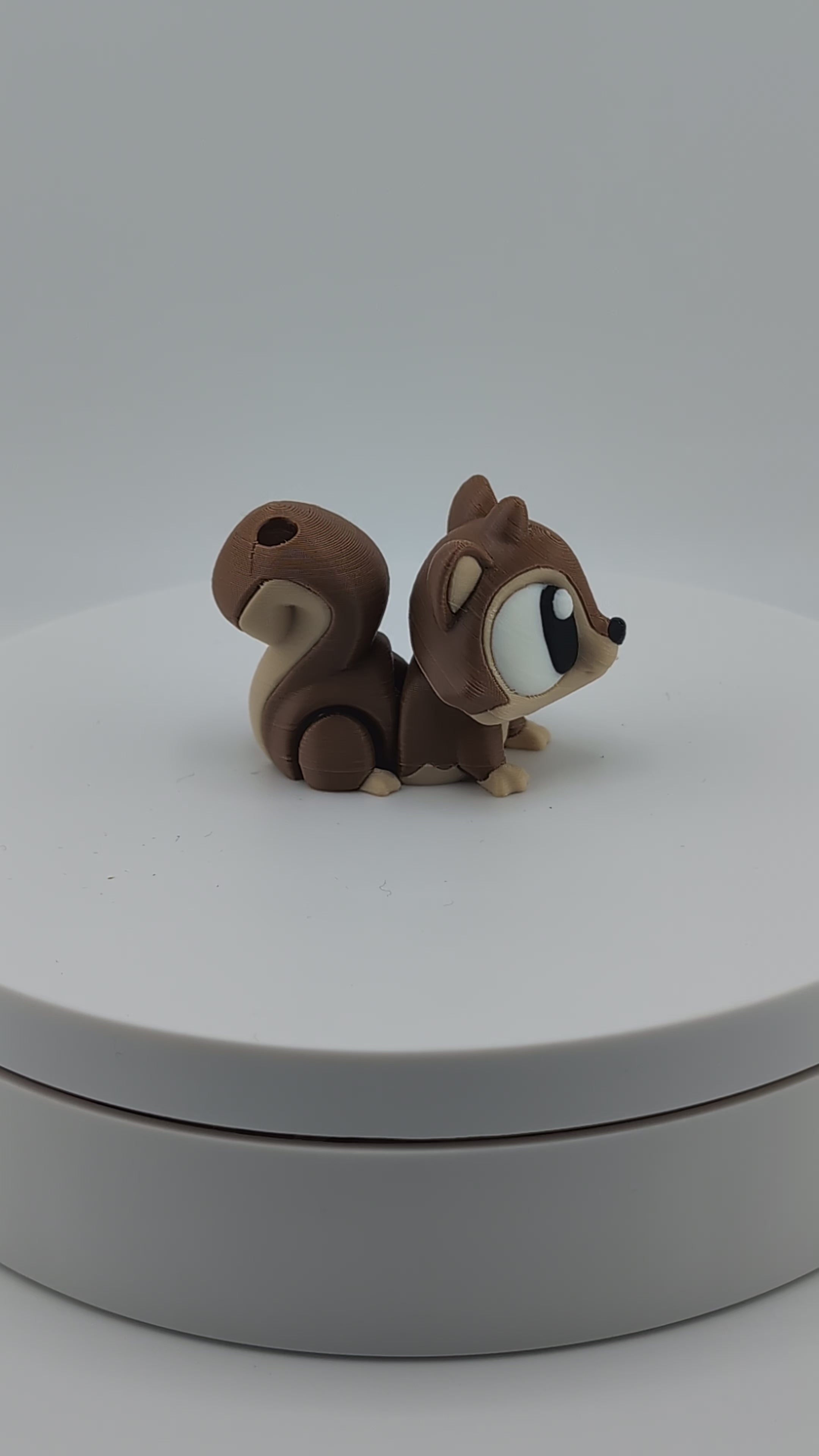 Add a dash of woodland whimsy with our Flexi Squirrel Keychain Charm!