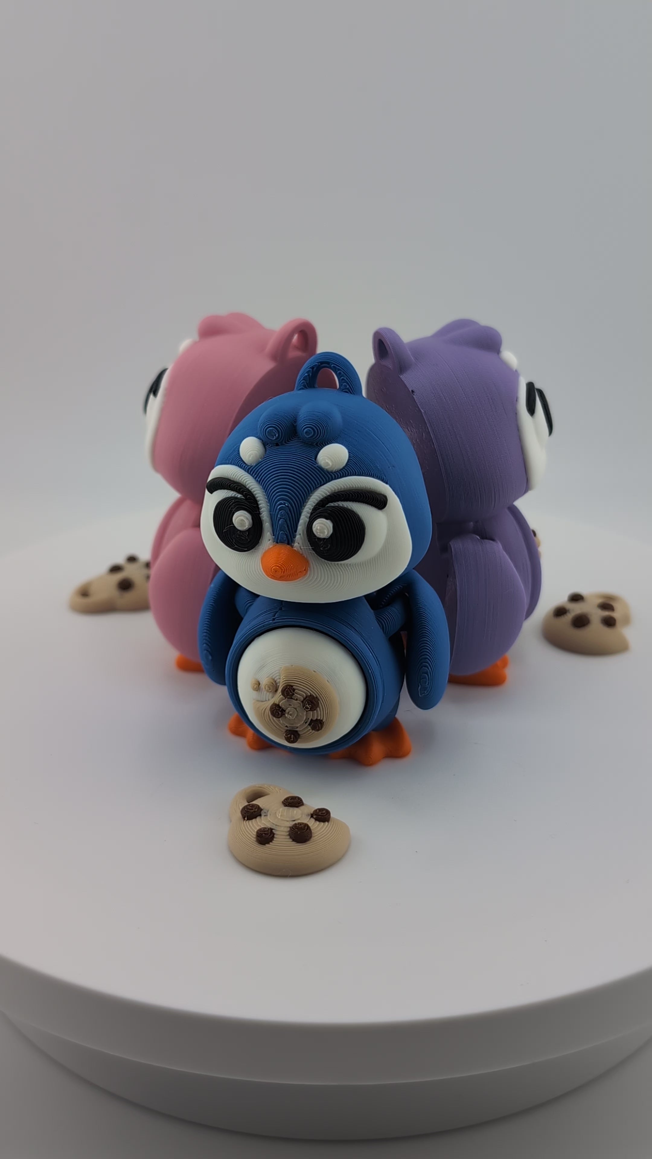 Waddle into fun with our Penguin Clicker Keychains!